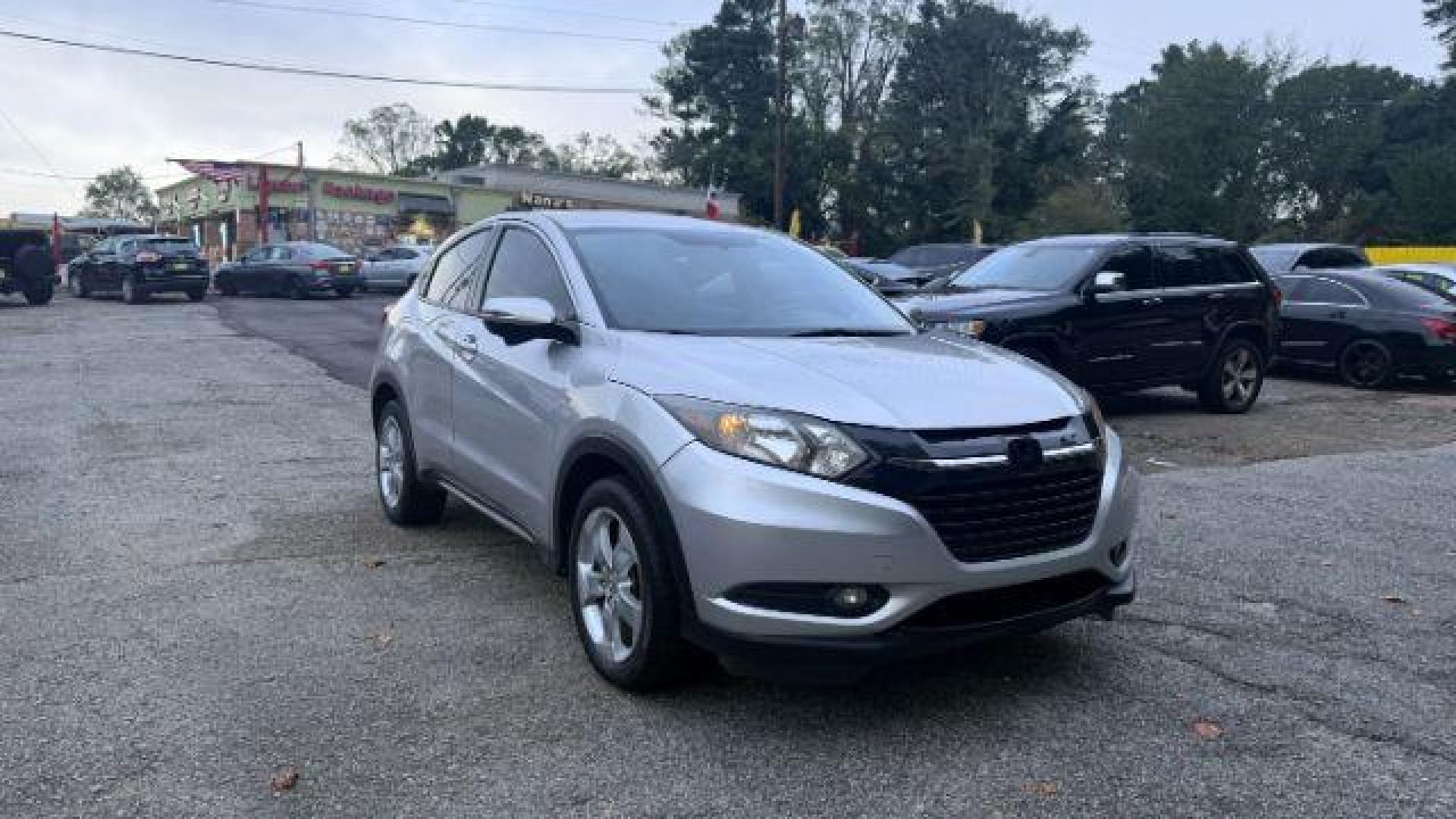 2016 Silver Honda HR-V EX (3CZRU6H53GM) with an 1.8L I-4 variable valve control engine, located at 1806 Veterans Memorial Hwy SW, Austell, GA, 30168, (770) 944-9558, 33.817959, -84.606987 - Photo#2