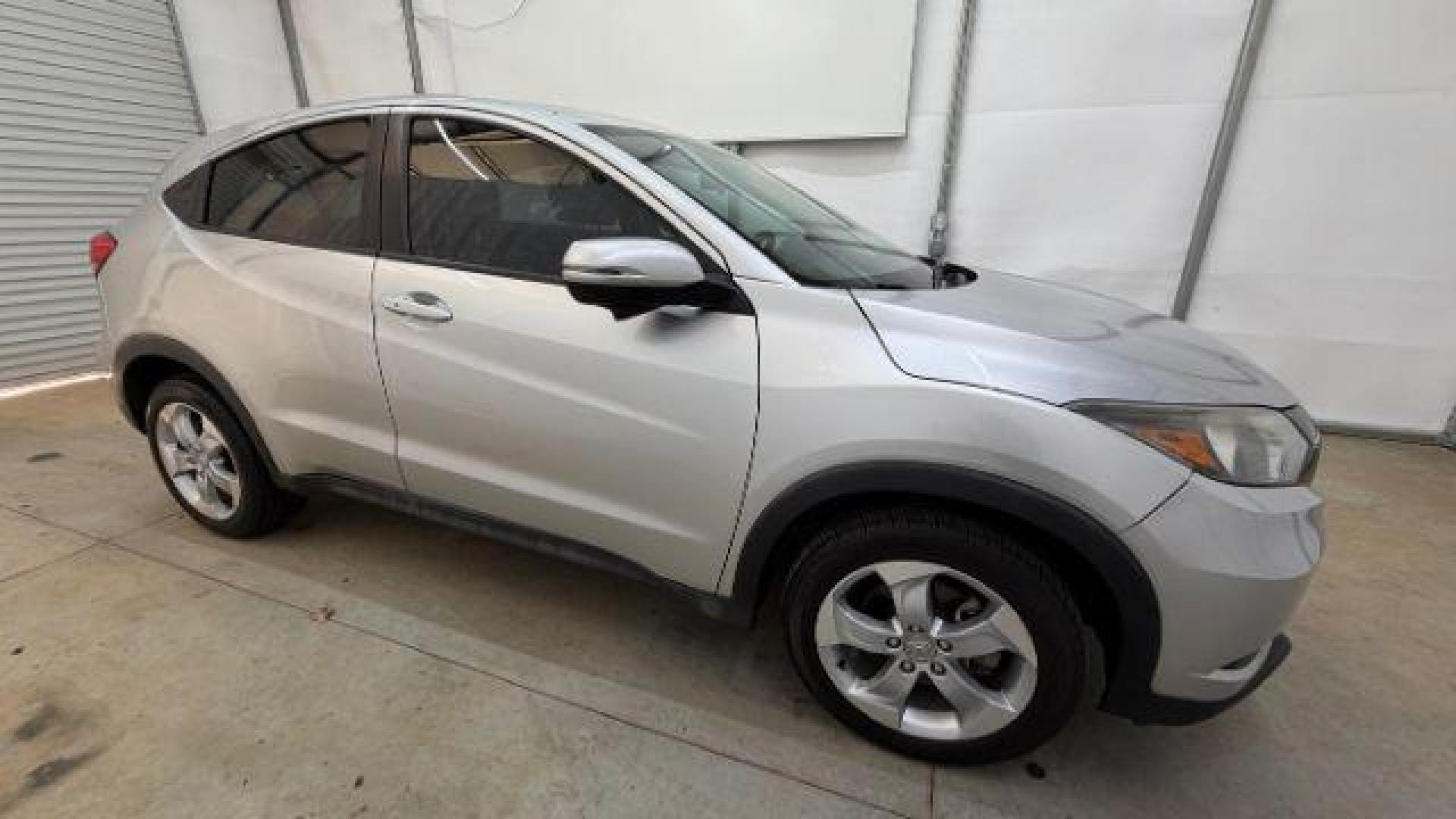 2016 Silver Honda HR-V EX (3CZRU6H53GM) with an 1.8L I-4 variable valve control engine, located at 1806 Veterans Memorial Hwy SW, Austell, GA, 30168, (770) 944-9558, 33.817959, -84.606987 - Photo#7