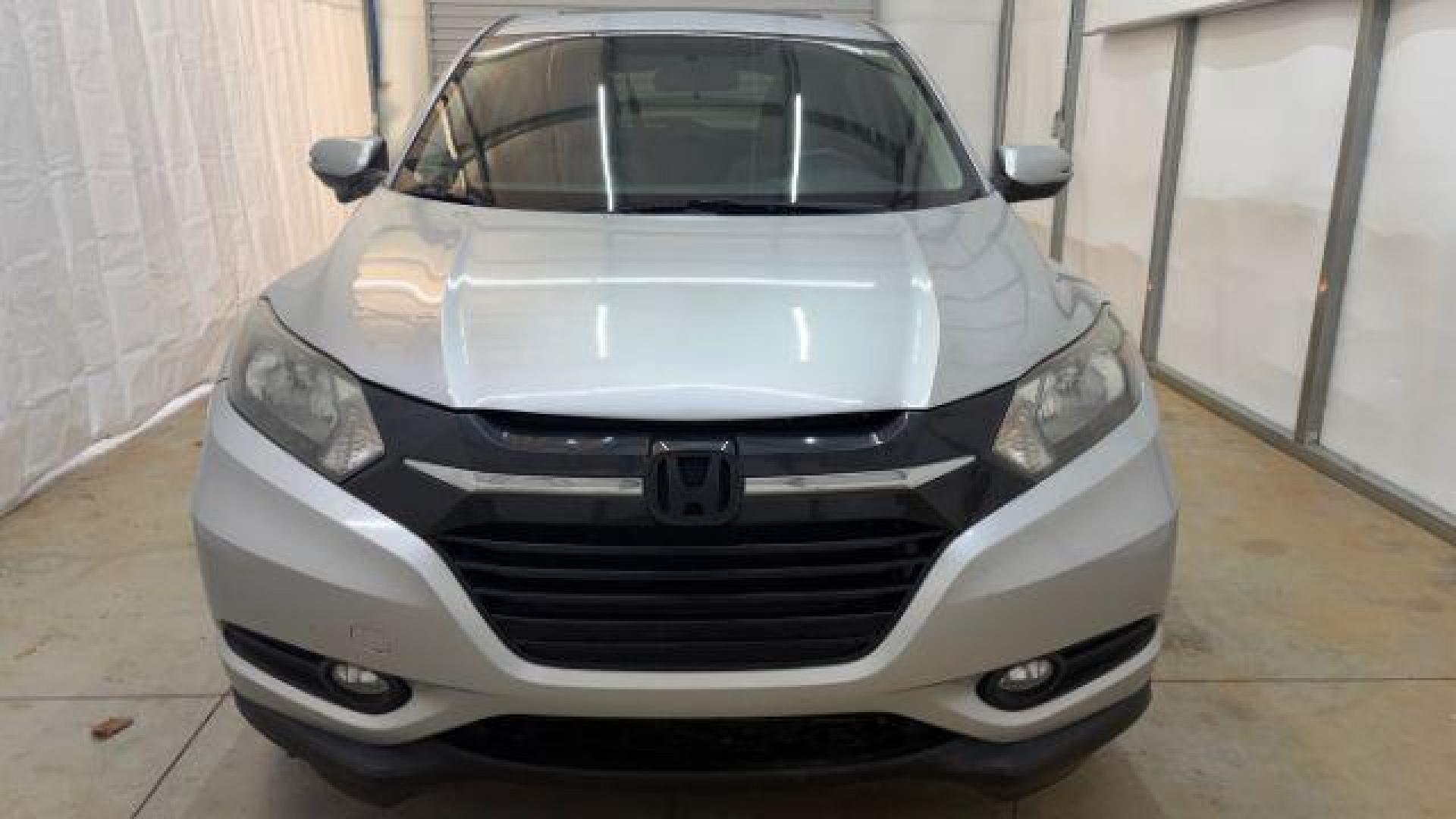 2016 Silver Honda HR-V EX (3CZRU6H53GM) with an 1.8L I-4 variable valve control engine, located at 1806 Veterans Memorial Hwy SW, Austell, GA, 30168, (770) 944-9558, 33.817959, -84.606987 - Photo#9