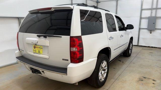 2011 White Chevrolet Tahoe LTZ (1GNSCCE0XBR) with an Vortec 5.3L V-8 variable valve control engine, located at 1806 Veterans Memorial Hwy SW, Austell, GA, 30168, (770) 944-9558, 33.817959, -84.606987 - Photo#5