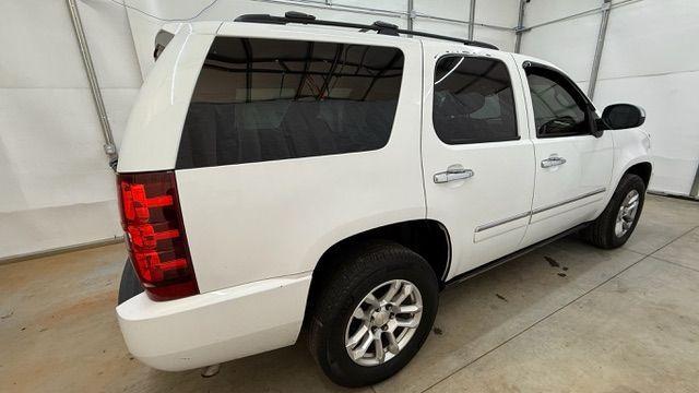 2011 White Chevrolet Tahoe LTZ (1GNSCCE0XBR) with an Vortec 5.3L V-8 variable valve control engine, located at 1806 Veterans Memorial Hwy SW, Austell, GA, 30168, (770) 944-9558, 33.817959, -84.606987 - Photo#6
