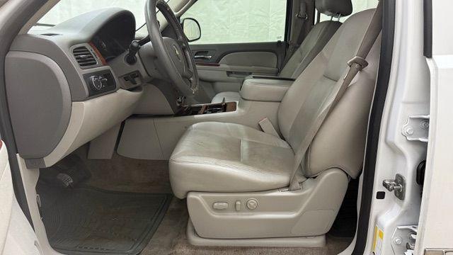 2011 White Chevrolet Tahoe LTZ (1GNSCCE0XBR) with an Vortec 5.3L V-8 variable valve control engine, located at 1806 Veterans Memorial Hwy SW, Austell, GA, 30168, (770) 944-9558, 33.817959, -84.606987 - Photo#11