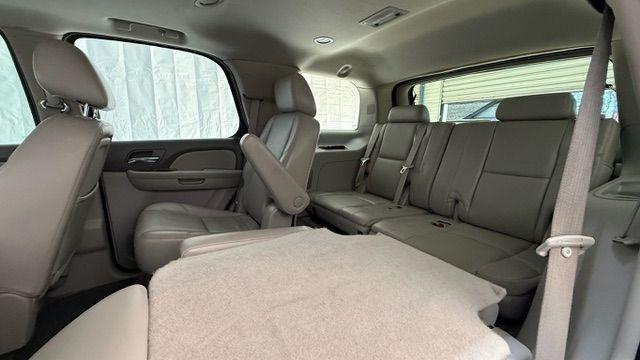 2011 White Chevrolet Tahoe LTZ (1GNSCCE0XBR) with an Vortec 5.3L V-8 variable valve control engine, located at 1806 Veterans Memorial Hwy SW, Austell, GA, 30168, (770) 944-9558, 33.817959, -84.606987 - Photo#15