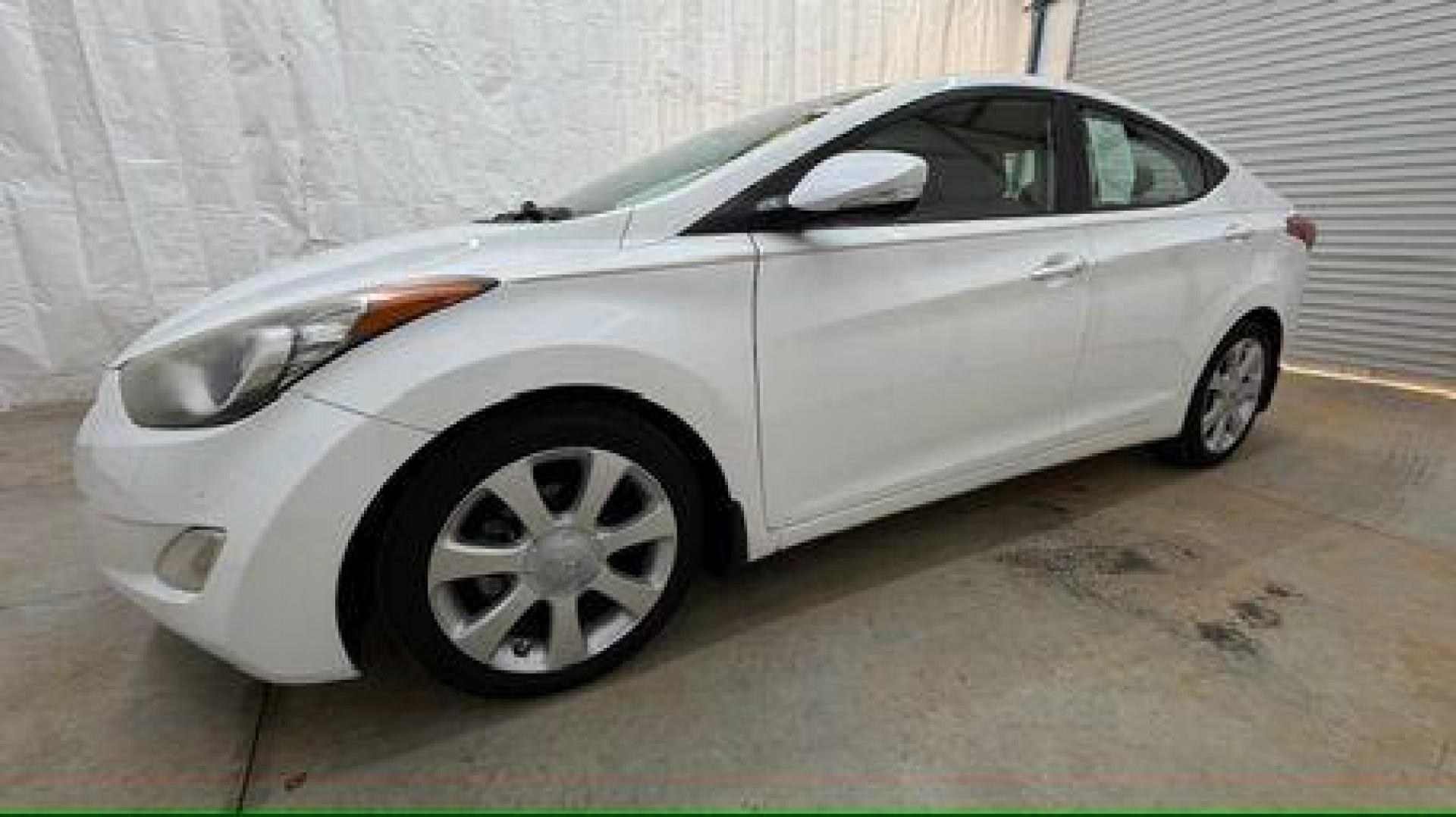 2013 White Hyundai Elantra Limited (5NPDH4AE2DH) with an 1.8L I-4 DOHC engine, located at 1806 Veterans Memorial Hwy SW, Austell, GA, 30168, (770) 944-9558, 33.817959, -84.606987 - Photo#1