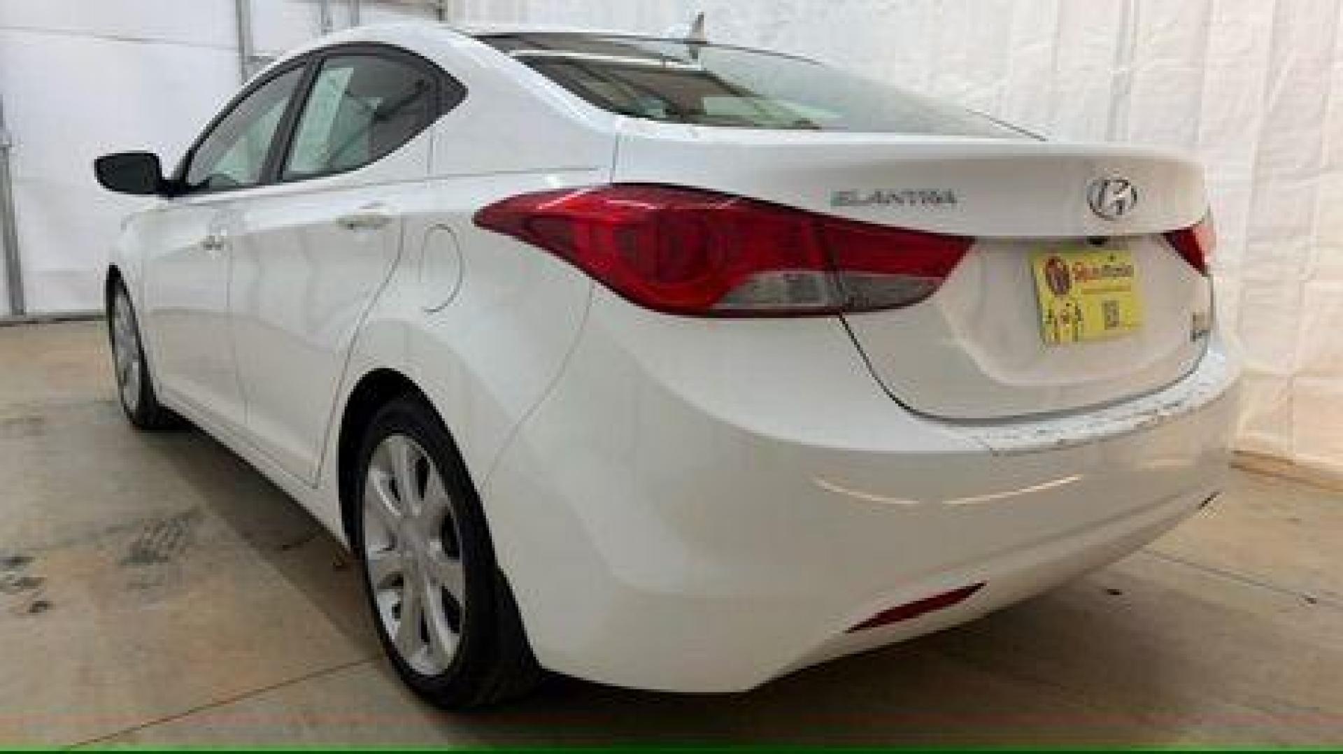 2013 White Hyundai Elantra Limited (5NPDH4AE2DH) with an 1.8L I-4 DOHC engine, located at 1806 Veterans Memorial Hwy SW, Austell, GA, 30168, (770) 944-9558, 33.817959, -84.606987 - Photo#3