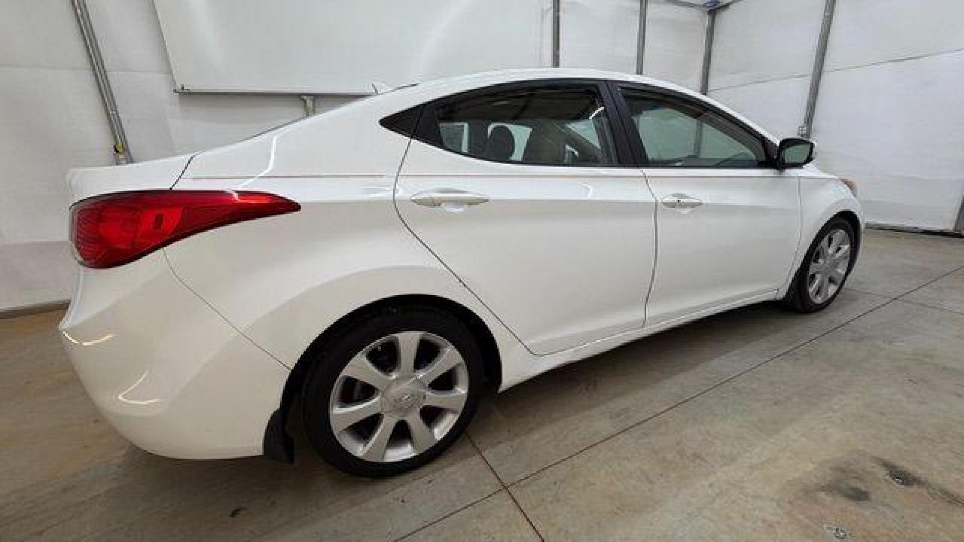 2013 White Hyundai Elantra Limited (5NPDH4AE2DH) with an 1.8L I-4 DOHC engine, located at 1806 Veterans Memorial Hwy SW, Austell, GA, 30168, (770) 944-9558, 33.817959, -84.606987 - Photo#6