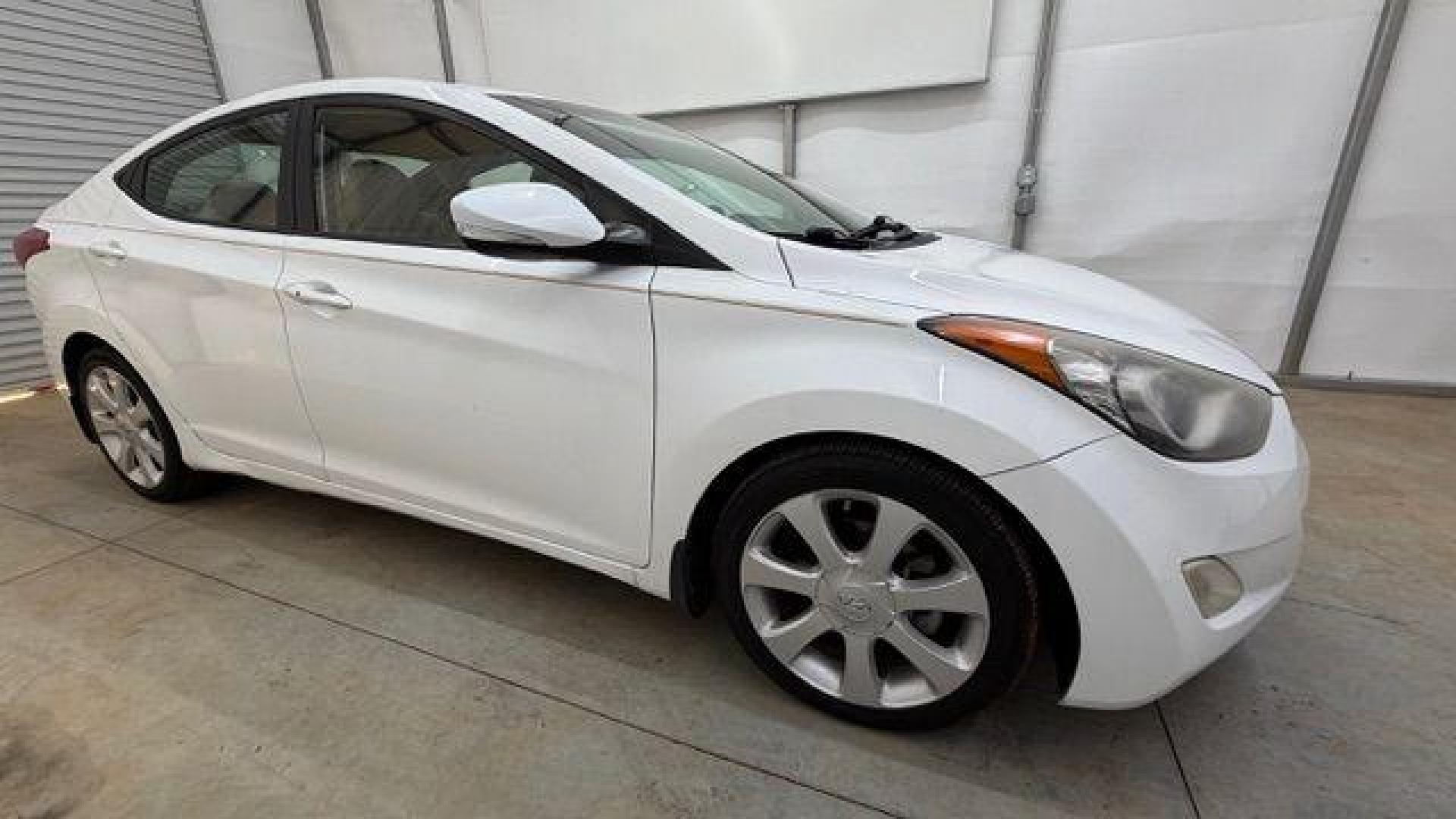2013 White Hyundai Elantra Limited (5NPDH4AE2DH) with an 1.8L I-4 DOHC engine, located at 1806 Veterans Memorial Hwy SW, Austell, GA, 30168, (770) 944-9558, 33.817959, -84.606987 - Photo#7