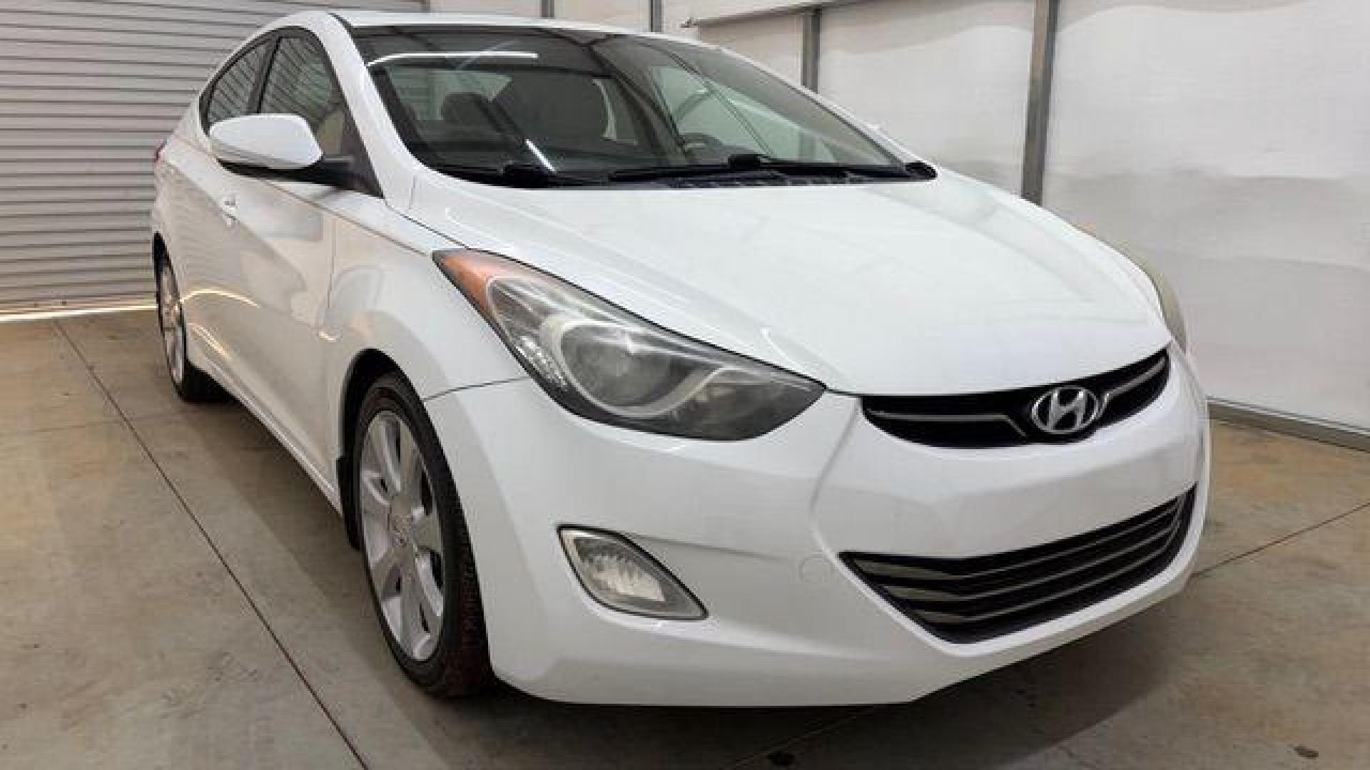 2013 White Hyundai Elantra Limited (5NPDH4AE2DH) with an 1.8L I-4 DOHC engine, located at 1806 Veterans Memorial Hwy SW, Austell, GA, 30168, (770) 944-9558, 33.817959, -84.606987 - Photo#8