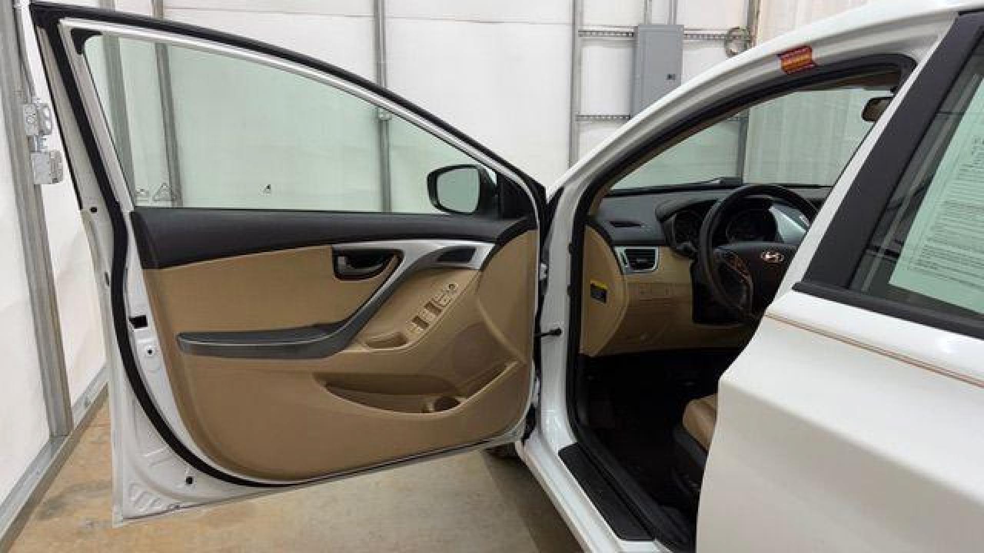 2013 White Hyundai Elantra Limited (5NPDH4AE2DH) with an 1.8L I-4 DOHC engine, located at 1806 Veterans Memorial Hwy SW, Austell, GA, 30168, (770) 944-9558, 33.817959, -84.606987 - Photo#10