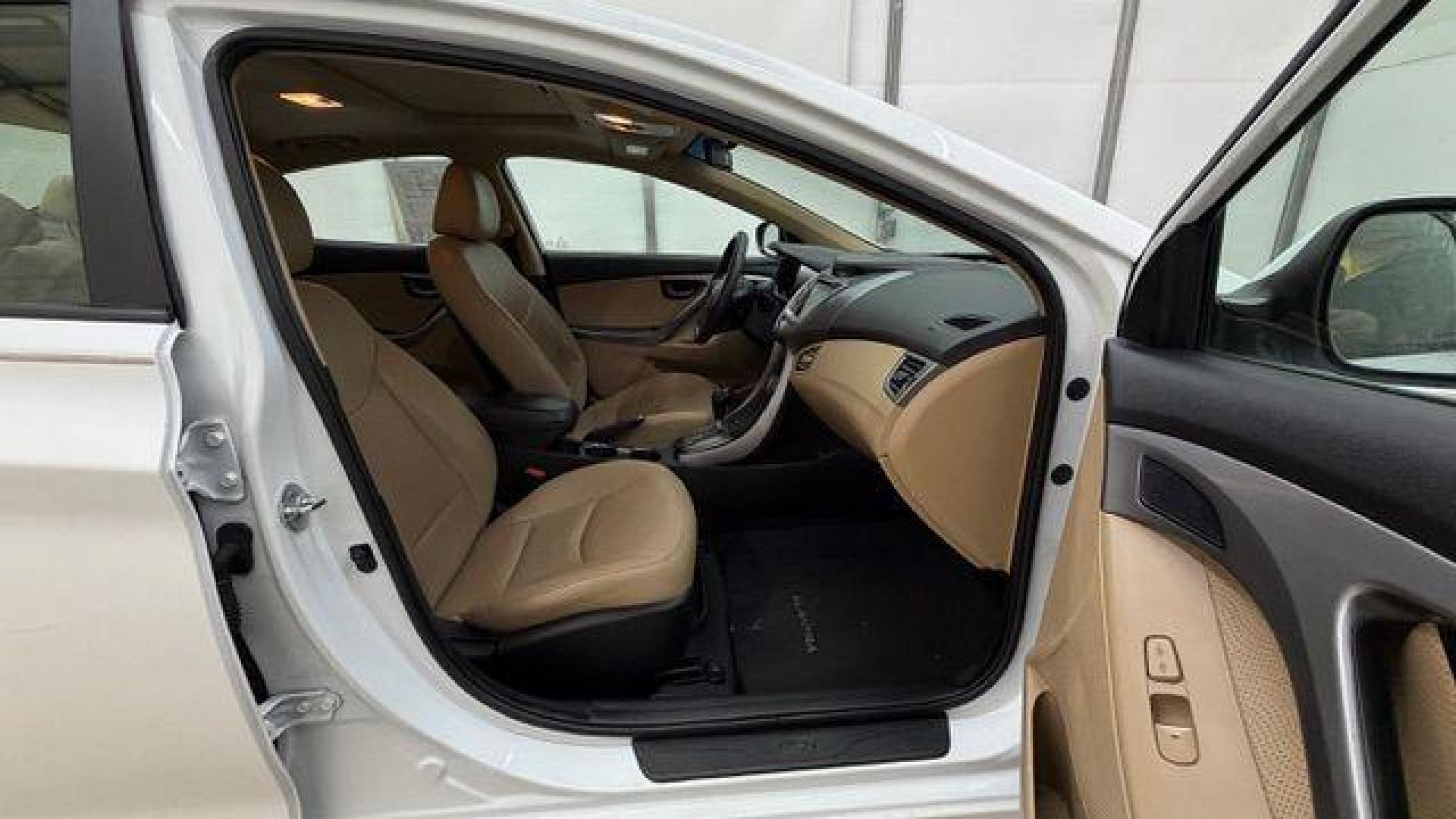 2013 White Hyundai Elantra Limited (5NPDH4AE2DH) with an 1.8L I-4 DOHC engine, located at 1806 Veterans Memorial Hwy SW, Austell, GA, 30168, (770) 944-9558, 33.817959, -84.606987 - Photo#16