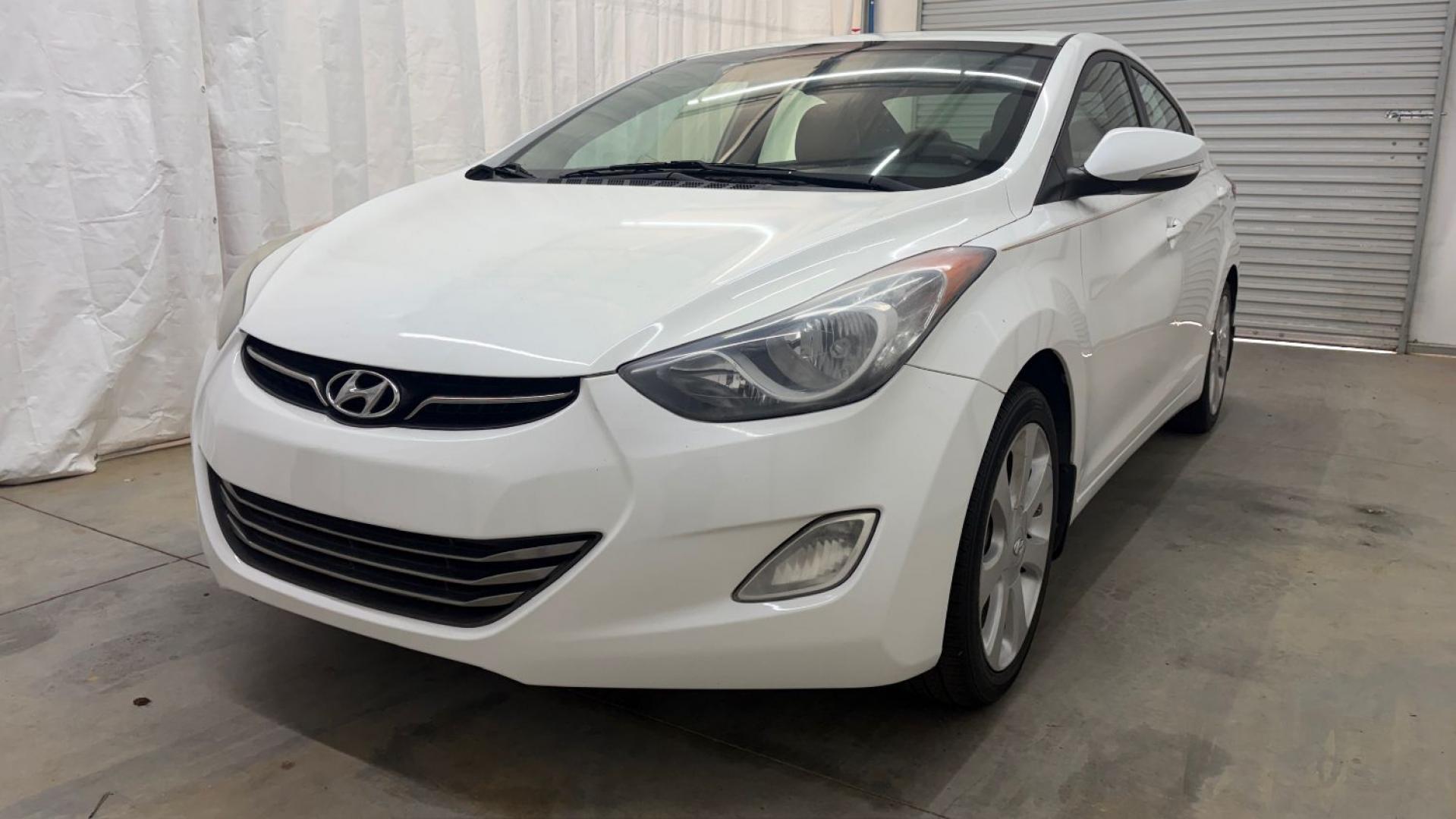 2013 White Hyundai Elantra Limited (5NPDH4AE2DH) with an 1.8L I-4 DOHC engine, located at 1806 Veterans Memorial Hwy SW, Austell, GA, 30168, (770) 944-9558, 33.817959, -84.606987- Photo#0