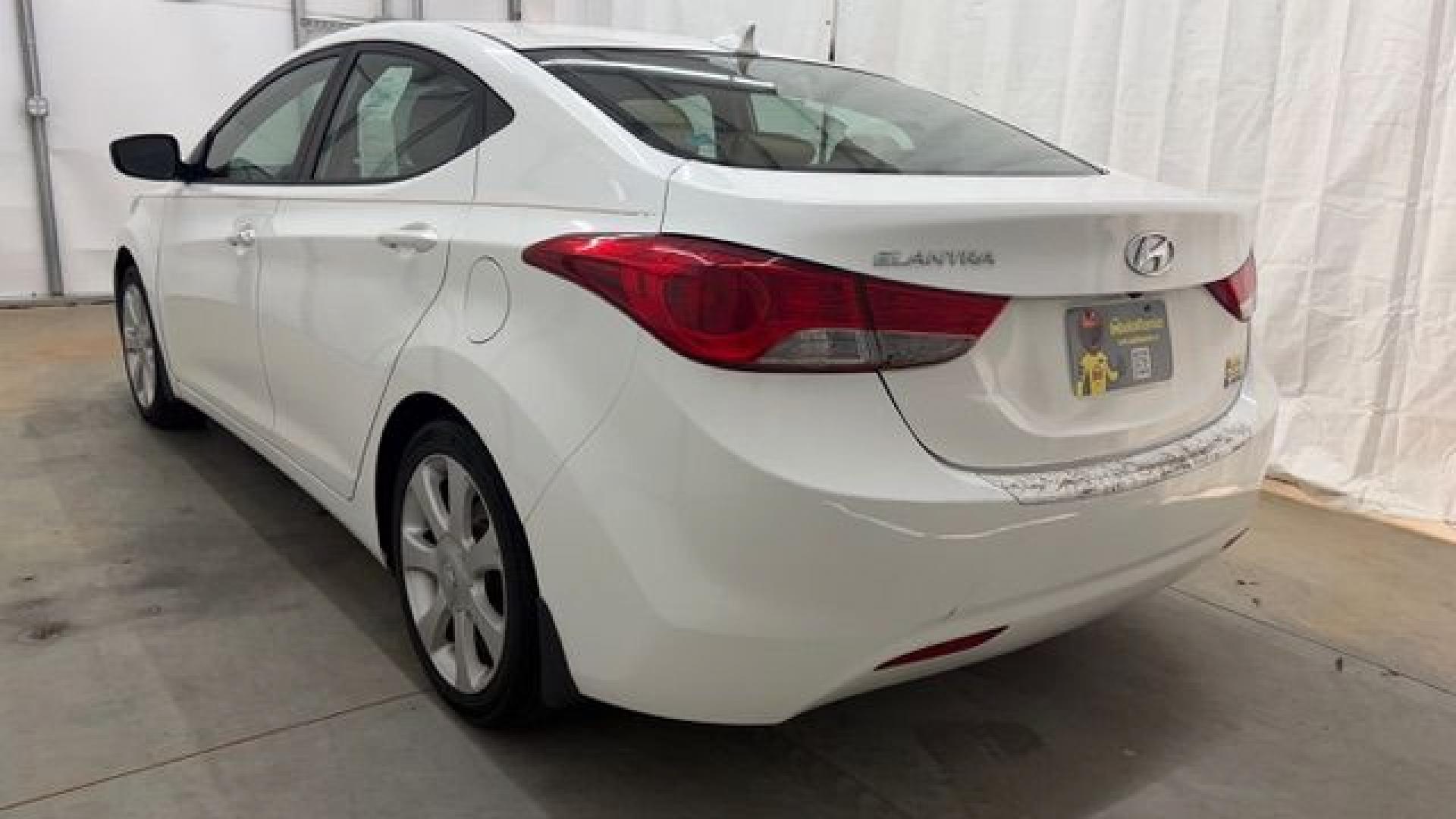 2013 White Hyundai Elantra Limited (5NPDH4AE2DH) with an 1.8L I-4 DOHC engine, located at 1806 Veterans Memorial Hwy SW, Austell, GA, 30168, (770) 944-9558, 33.817959, -84.606987- Photo#3