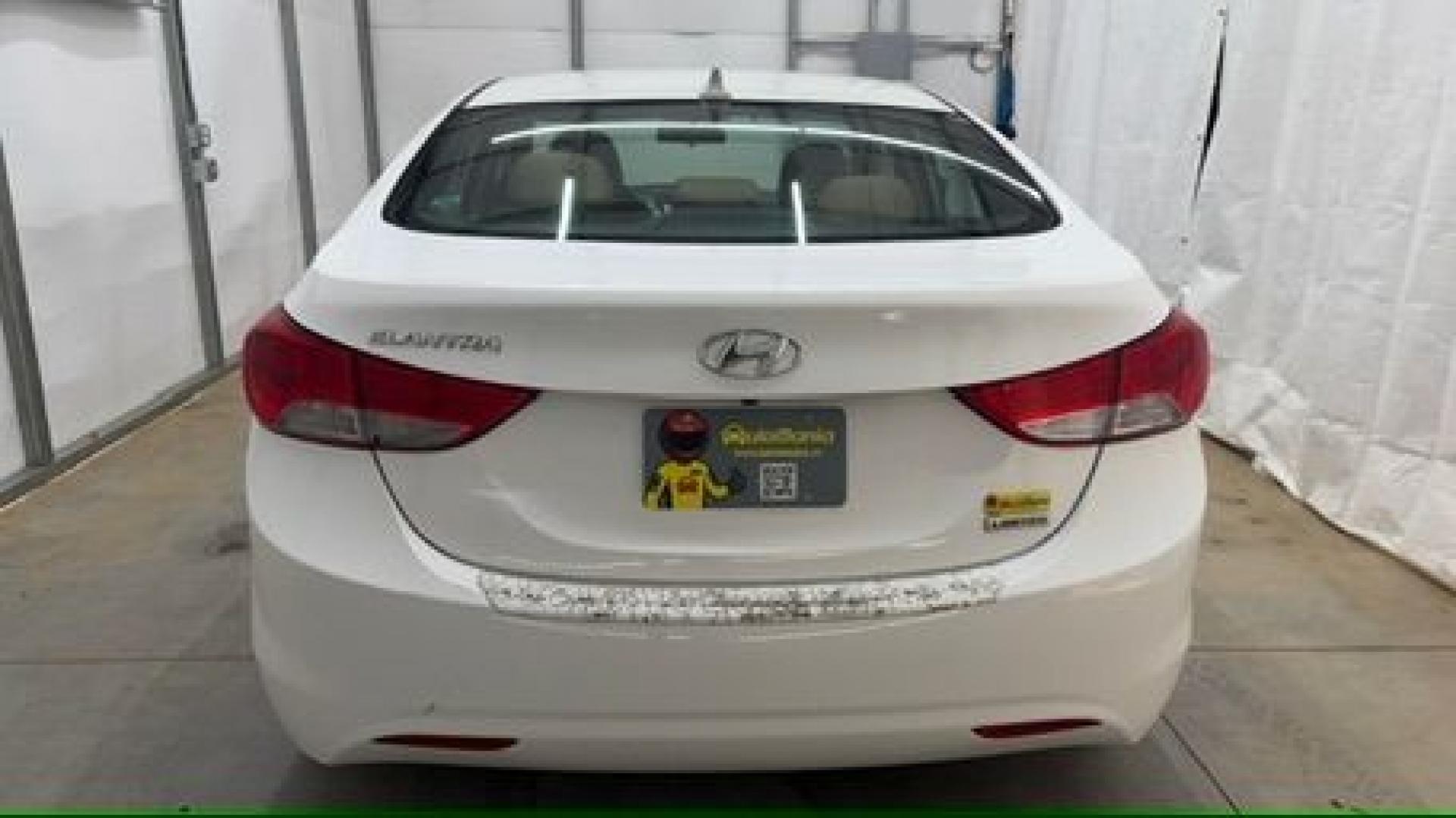 2013 White Hyundai Elantra Limited (5NPDH4AE2DH) with an 1.8L I-4 DOHC engine, located at 1806 Veterans Memorial Hwy SW, Austell, GA, 30168, (770) 944-9558, 33.817959, -84.606987- Photo#4