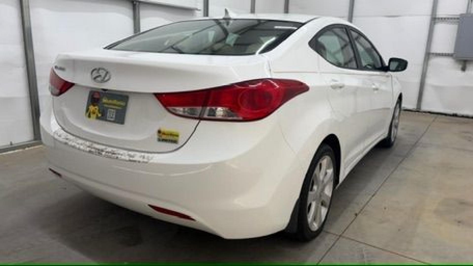 2013 White Hyundai Elantra Limited (5NPDH4AE2DH) with an 1.8L I-4 DOHC engine, located at 1806 Veterans Memorial Hwy SW, Austell, GA, 30168, (770) 944-9558, 33.817959, -84.606987- Photo#5