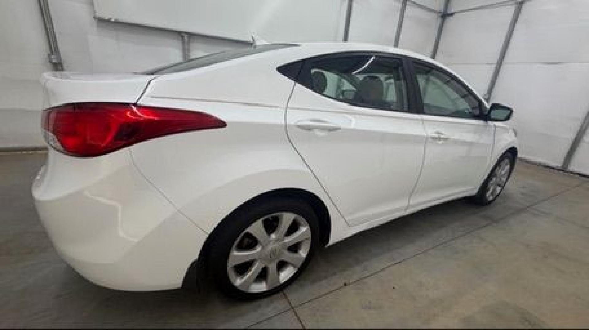 2013 White Hyundai Elantra Limited (5NPDH4AE2DH) with an 1.8L I-4 DOHC engine, located at 1806 Veterans Memorial Hwy SW, Austell, GA, 30168, (770) 944-9558, 33.817959, -84.606987- Photo#6