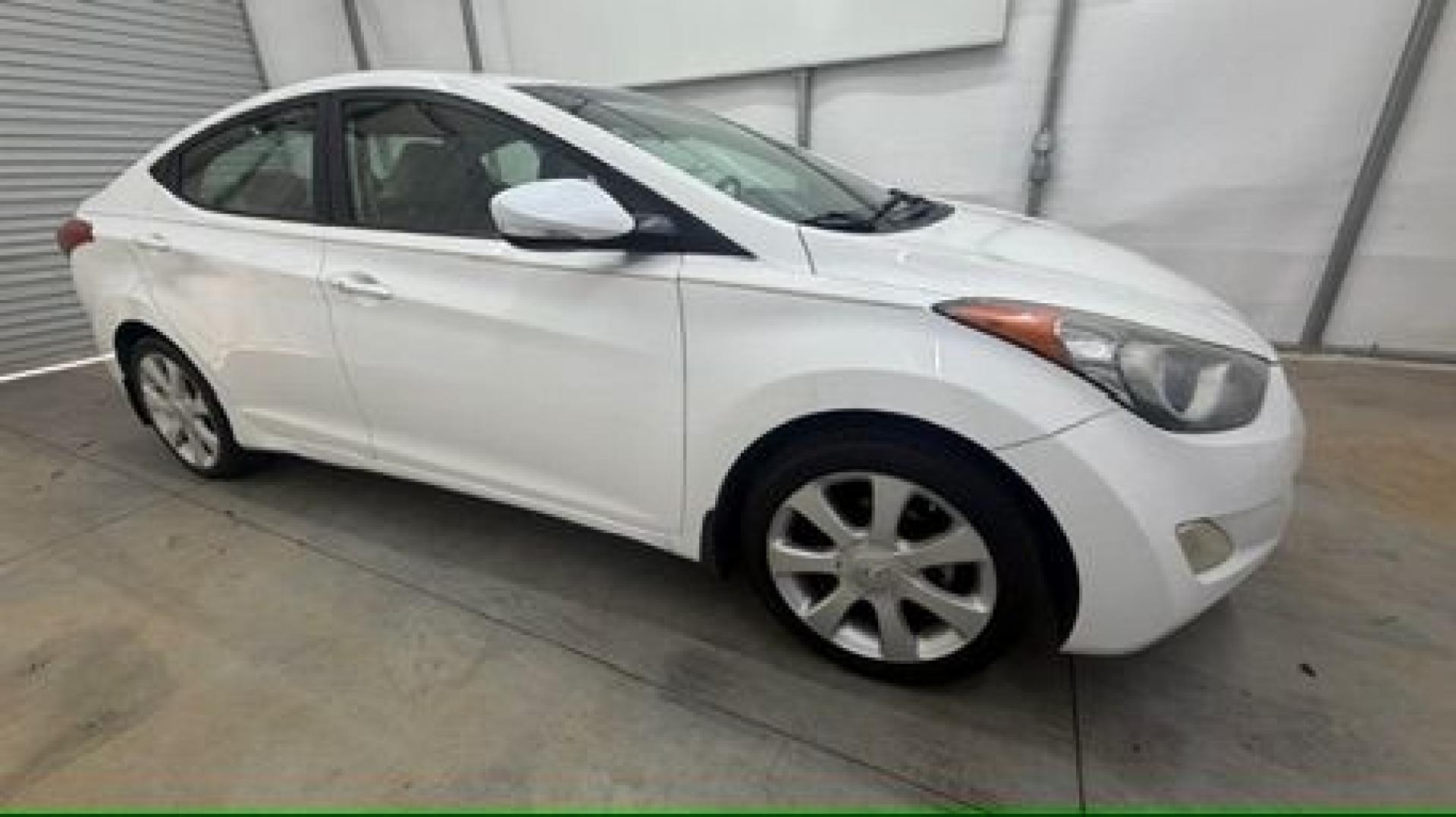 2013 White Hyundai Elantra Limited (5NPDH4AE2DH) with an 1.8L I-4 DOHC engine, located at 1806 Veterans Memorial Hwy SW, Austell, GA, 30168, (770) 944-9558, 33.817959, -84.606987- Photo#7