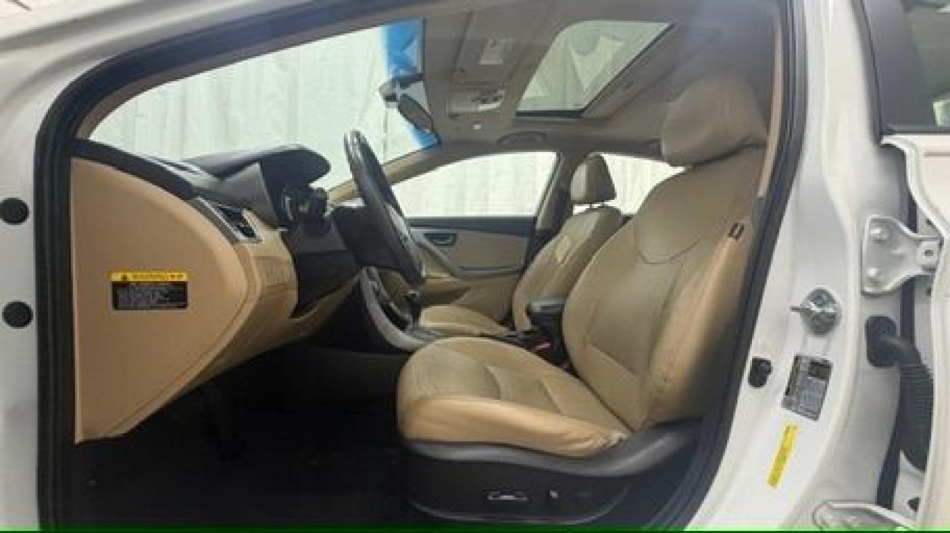 2013 White Hyundai Elantra Limited (5NPDH4AE2DH) with an 1.8L I-4 DOHC engine, located at 1806 Veterans Memorial Hwy SW, Austell, GA, 30168, (770) 944-9558, 33.817959, -84.606987- Photo#12
