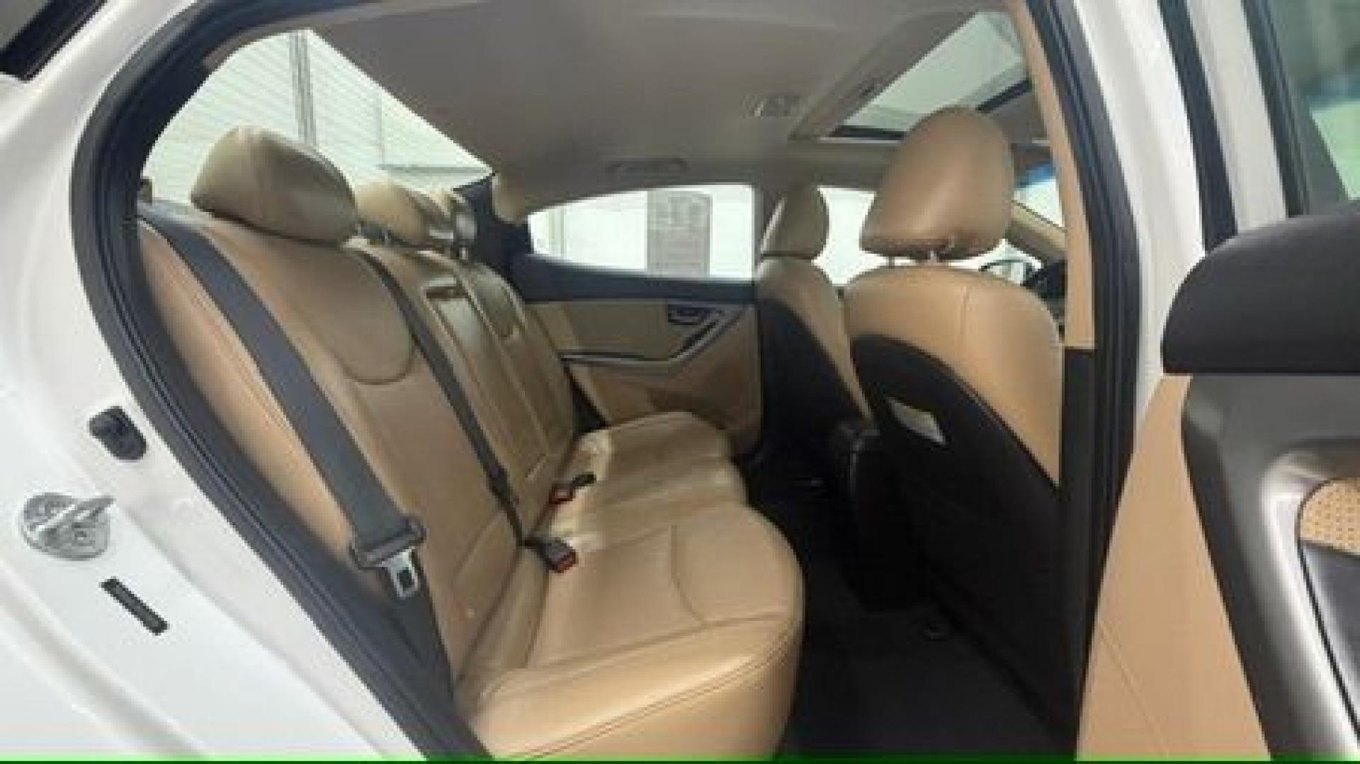 2013 White Hyundai Elantra Limited (5NPDH4AE2DH) with an 1.8L I-4 DOHC engine, located at 1806 Veterans Memorial Hwy SW, Austell, GA, 30168, (770) 944-9558, 33.817959, -84.606987- Photo#16