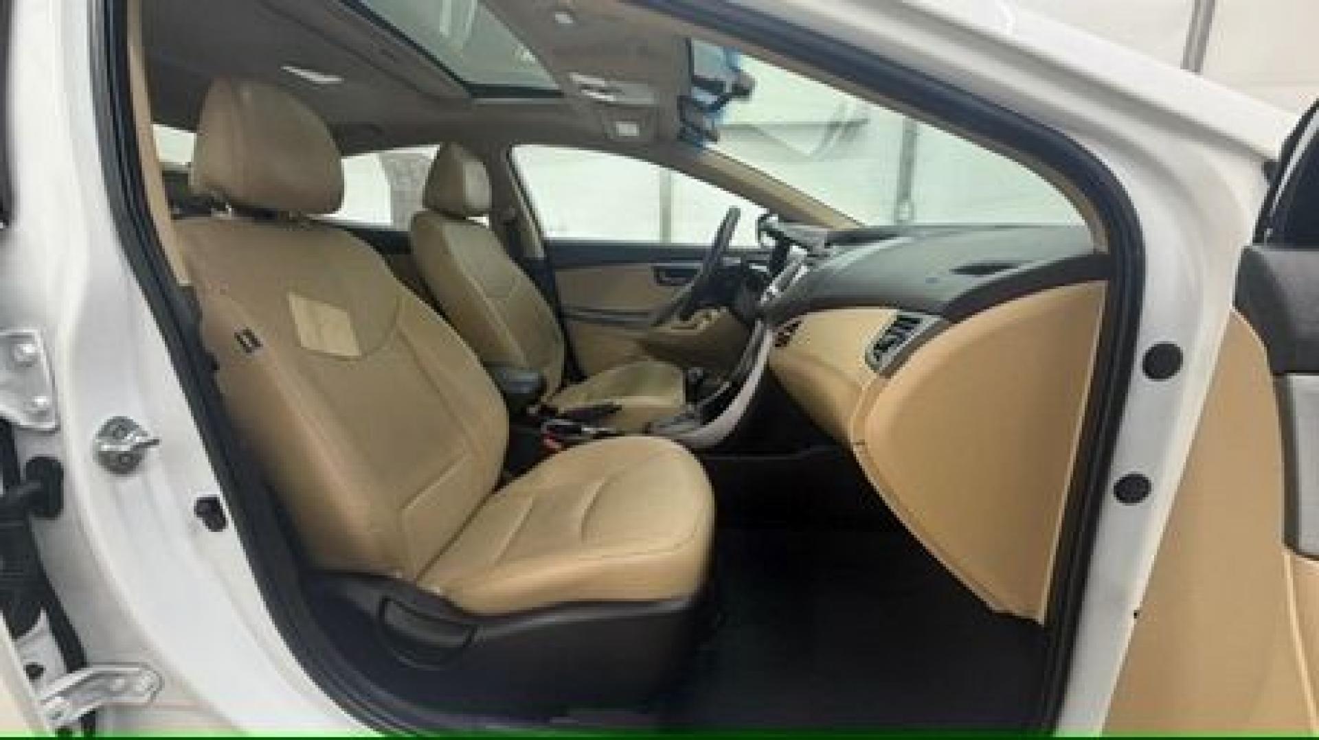2013 White Hyundai Elantra Limited (5NPDH4AE2DH) with an 1.8L I-4 DOHC engine, located at 1806 Veterans Memorial Hwy SW, Austell, GA, 30168, (770) 944-9558, 33.817959, -84.606987- Photo#17
