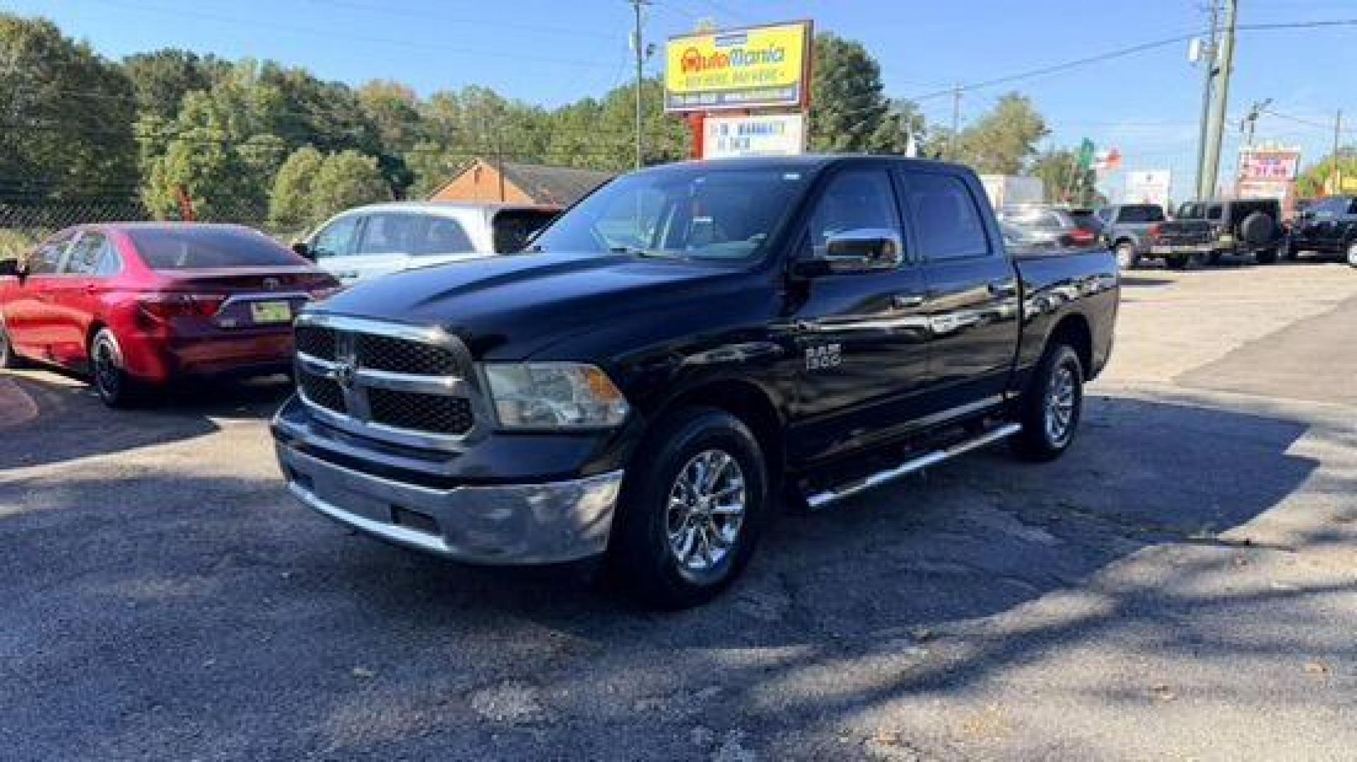 2014 Black Ram 1500 SLT (1C6RR6LGXES) , located at 1806 Veterans Memorial Hwy SW, Austell, GA, 30168, (770) 944-9558, 33.817959, -84.606987 - Photo#0