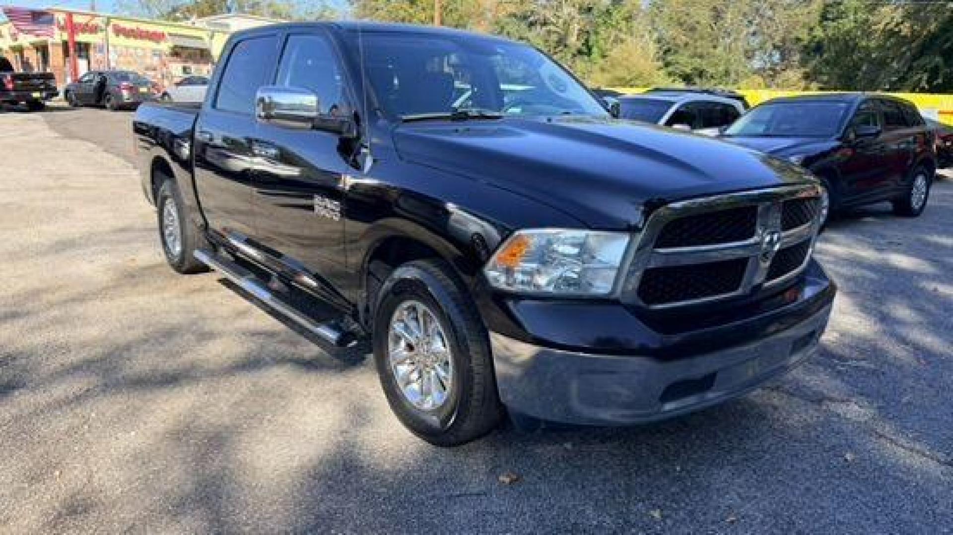 2014 Black Ram 1500 SLT (1C6RR6LGXES) , located at 1806 Veterans Memorial Hwy SW, Austell, GA, 30168, (770) 944-9558, 33.817959, -84.606987 - Photo#2