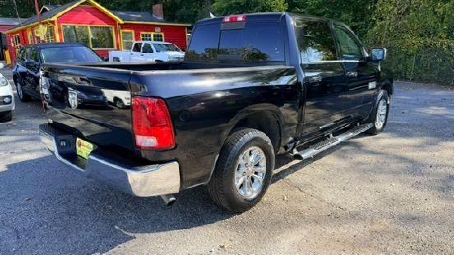 2014 Black Ram 1500 SLT (1C6RR6LGXES) , located at 1806 Veterans Memorial Hwy SW, Austell, GA, 30168, (770) 944-9558, 33.817959, -84.606987 - Photo#3