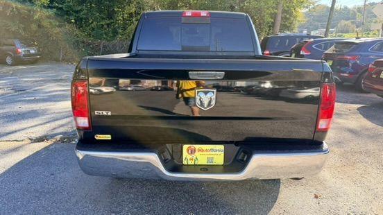 2014 Black Ram 1500 SLT (1C6RR6LGXES) , located at 1806 Veterans Memorial Hwy SW, Austell, GA, 30168, (770) 944-9558, 33.817959, -84.606987 - Photo#4