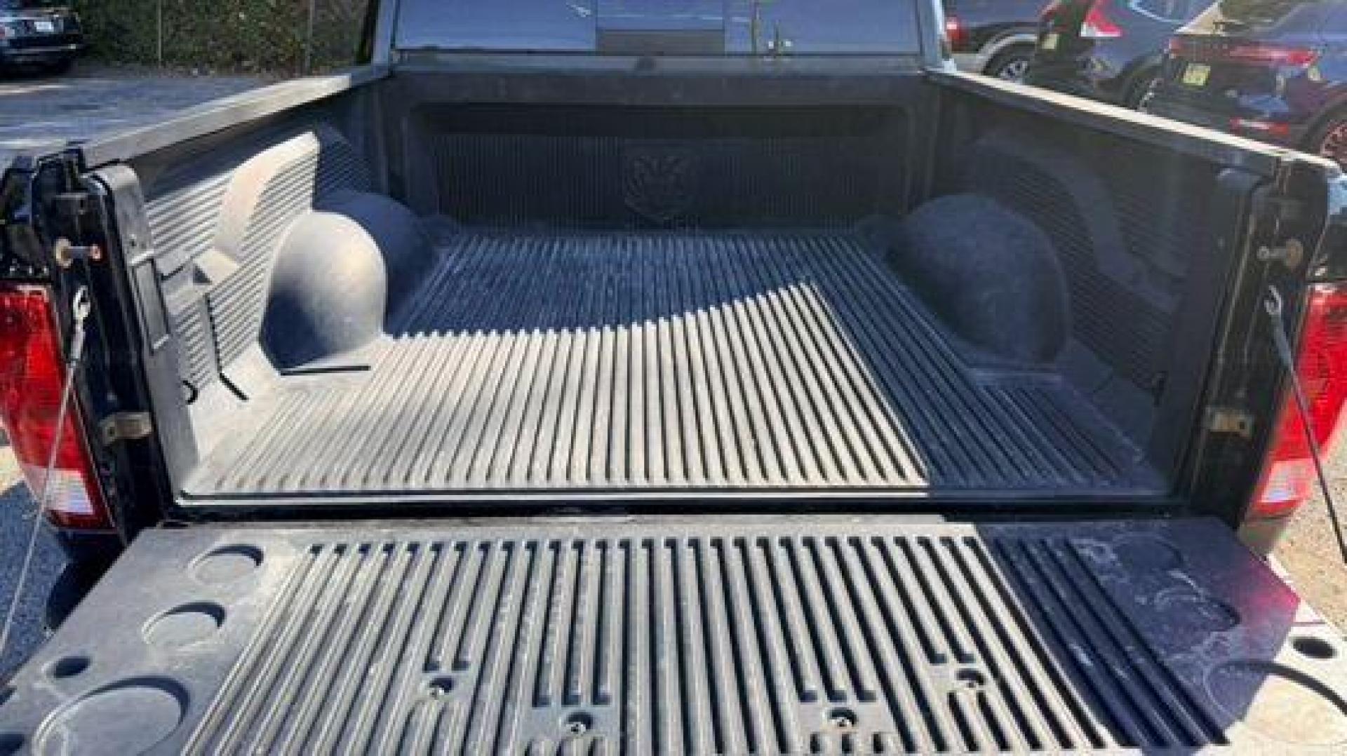 2014 Black Ram 1500 SLT (1C6RR6LGXES) , located at 1806 Veterans Memorial Hwy SW, Austell, GA, 30168, (770) 944-9558, 33.817959, -84.606987 - Photo#8