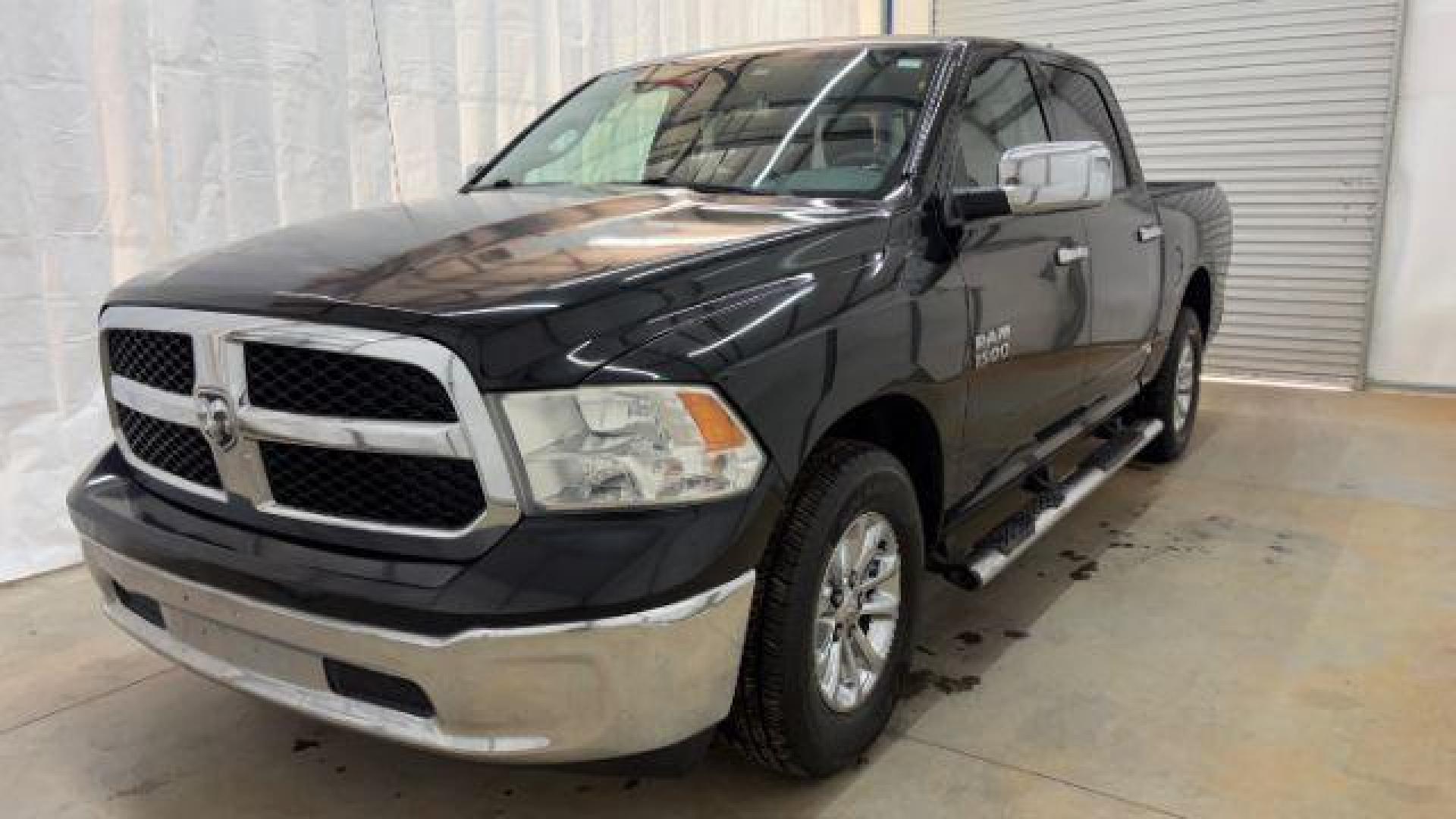 2014 Black Ram 1500 SLT (1C6RR6LGXES) , located at 1806 Veterans Memorial Hwy SW, Austell, GA, 30168, (770) 944-9558, 33.817959, -84.606987 - Photo#0