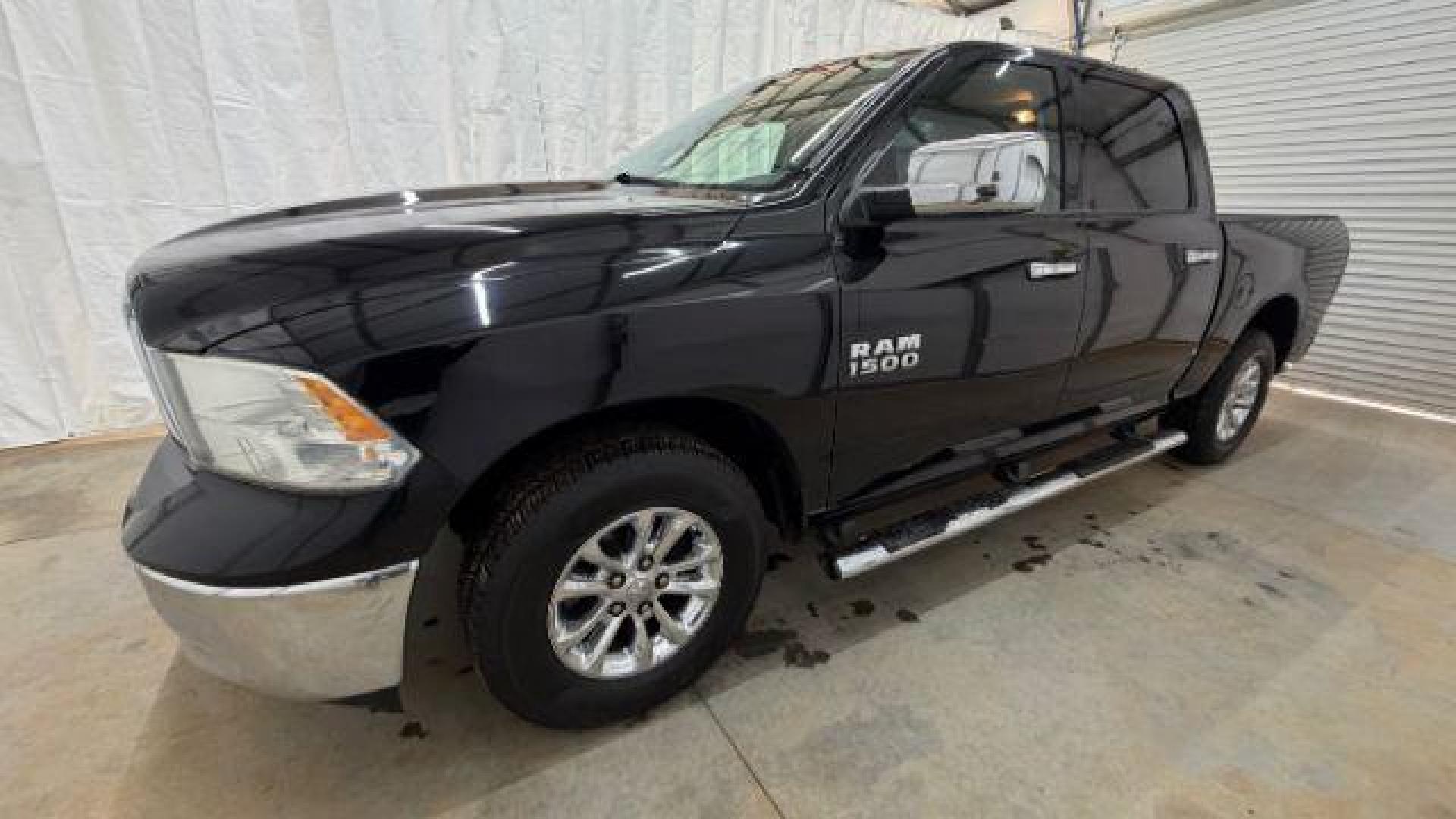 2014 Black Ram 1500 SLT (1C6RR6LGXES) , located at 1806 Veterans Memorial Hwy SW, Austell, GA, 30168, (770) 944-9558, 33.817959, -84.606987 - Photo#1