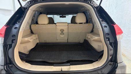 2017 Black Nissan Rogue S (JN8AT2MT7HW) with an 2.5L I-4 DOHC engine, located at 1806 Veterans Memorial Hwy SW, Austell, GA, 30168, (770) 944-9558, 33.817959, -84.606987 - Photo#16