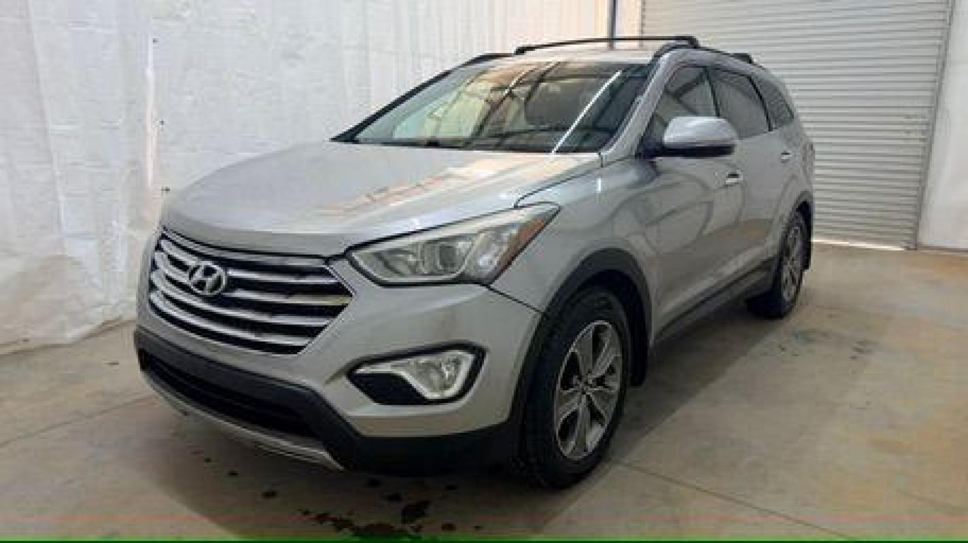 2014 Silver Hyundai Santa Fe GLS (KM8SN4HF3EU) with an Lambda II 3.3L V-6 gasoline direct injection engine, located at 1806 Veterans Memorial Hwy SW, Austell, GA, 30168, (770) 944-9558, 33.817959, -84.606987 - Photo#0