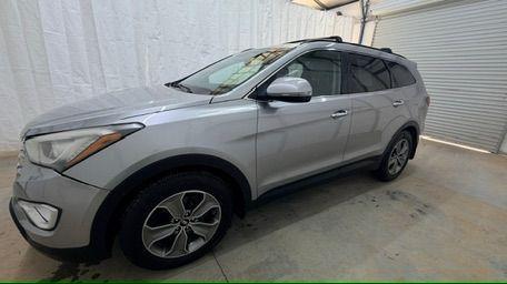 2014 Silver Hyundai Santa Fe GLS (KM8SN4HF3EU) with an Lambda II 3.3L V-6 gasoline direct injection engine, located at 1806 Veterans Memorial Hwy SW, Austell, GA, 30168, (770) 944-9558, 33.817959, -84.606987 - Photo#1