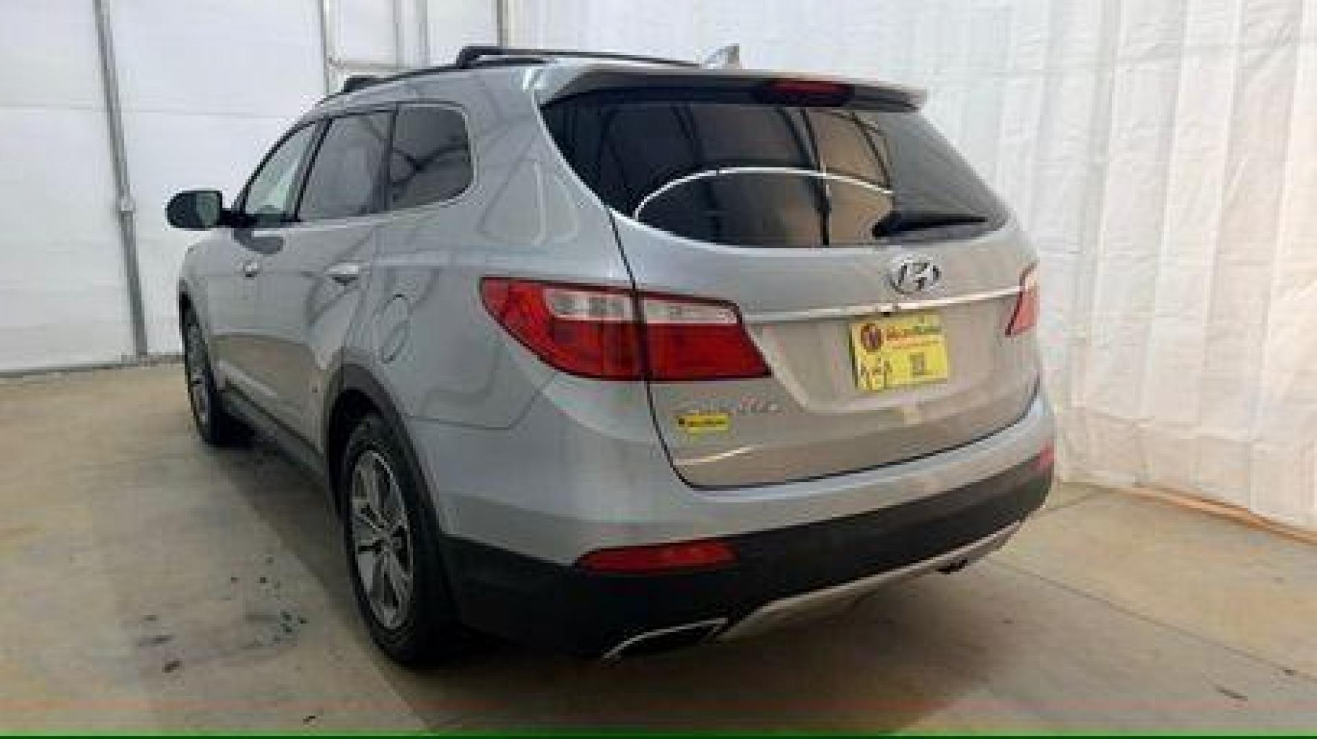 2014 Silver Hyundai Santa Fe GLS (KM8SN4HF3EU) with an Lambda II 3.3L V-6 gasoline direct injection engine, located at 1806 Veterans Memorial Hwy SW, Austell, GA, 30168, (770) 944-9558, 33.817959, -84.606987 - Photo#3
