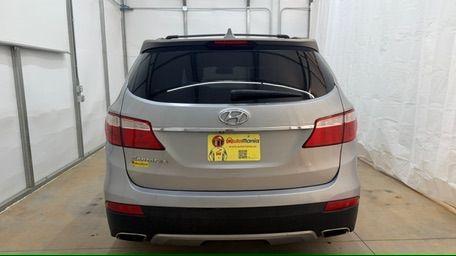 2014 Silver Hyundai Santa Fe GLS (KM8SN4HF3EU) with an Lambda II 3.3L V-6 gasoline direct injection engine, located at 1806 Veterans Memorial Hwy SW, Austell, GA, 30168, (770) 944-9558, 33.817959, -84.606987 - Photo#4