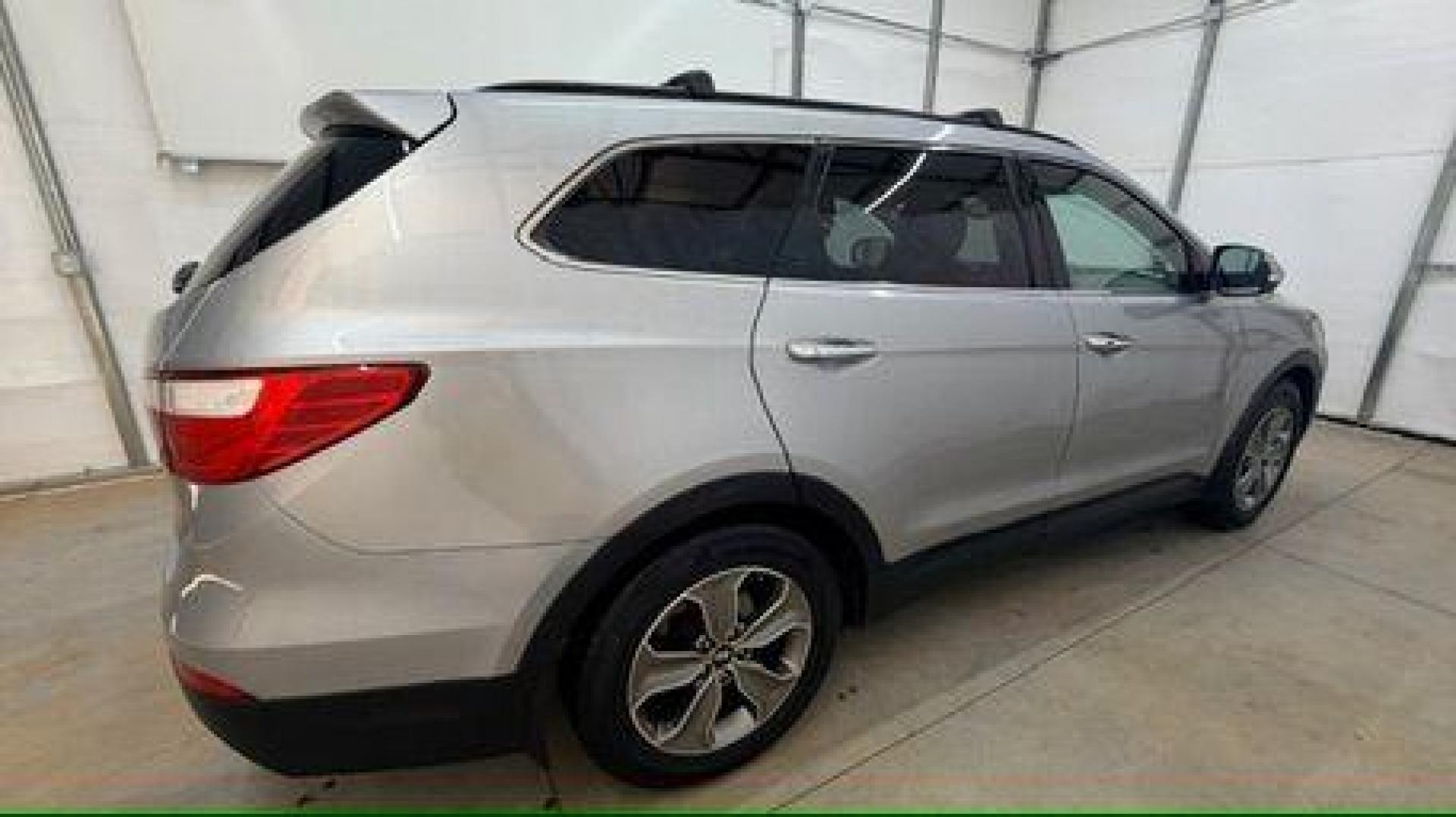 2014 Silver Hyundai Santa Fe GLS (KM8SN4HF3EU) with an Lambda II 3.3L V-6 gasoline direct injection engine, located at 1806 Veterans Memorial Hwy SW, Austell, GA, 30168, (770) 944-9558, 33.817959, -84.606987 - Photo#6