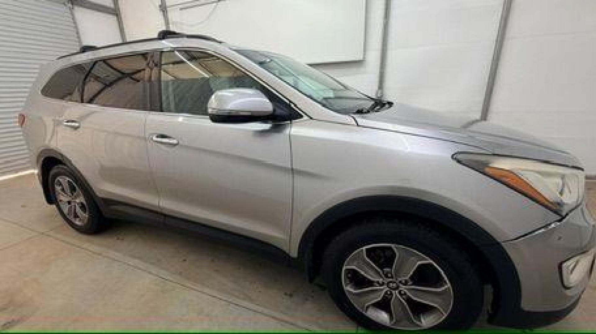 2014 Silver Hyundai Santa Fe GLS (KM8SN4HF3EU) with an Lambda II 3.3L V-6 gasoline direct injection engine, located at 1806 Veterans Memorial Hwy SW, Austell, GA, 30168, (770) 944-9558, 33.817959, -84.606987 - Photo#7