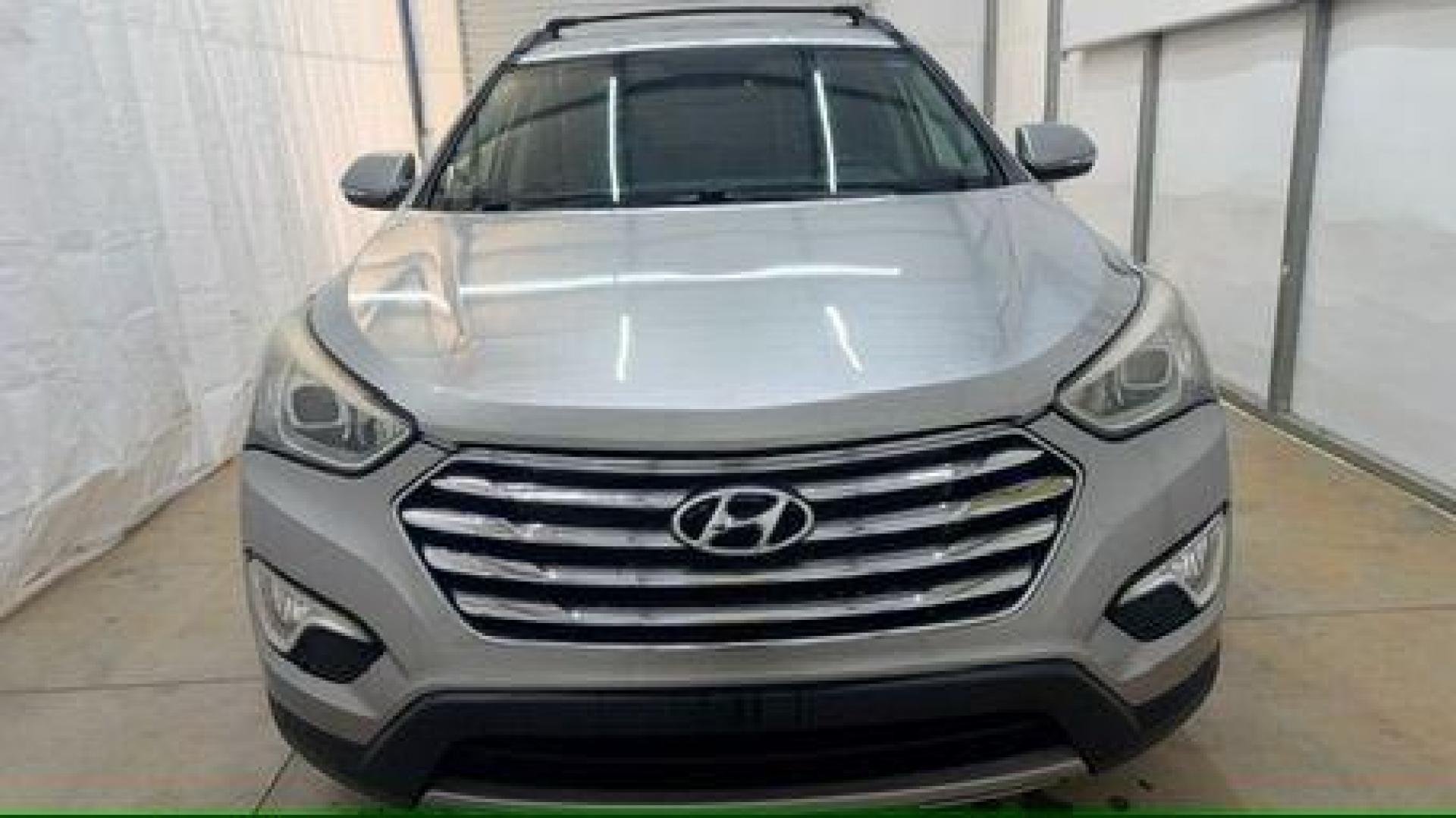 2014 Silver Hyundai Santa Fe GLS (KM8SN4HF3EU) with an Lambda II 3.3L V-6 gasoline direct injection engine, located at 1806 Veterans Memorial Hwy SW, Austell, GA, 30168, (770) 944-9558, 33.817959, -84.606987 - Photo#9