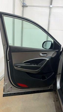 2014 Silver Hyundai Santa Fe GLS (KM8SN4HF3EU) with an Lambda II 3.3L V-6 gasoline direct injection engine, located at 1806 Veterans Memorial Hwy SW, Austell, GA, 30168, (770) 944-9558, 33.817959, -84.606987 - Photo#10