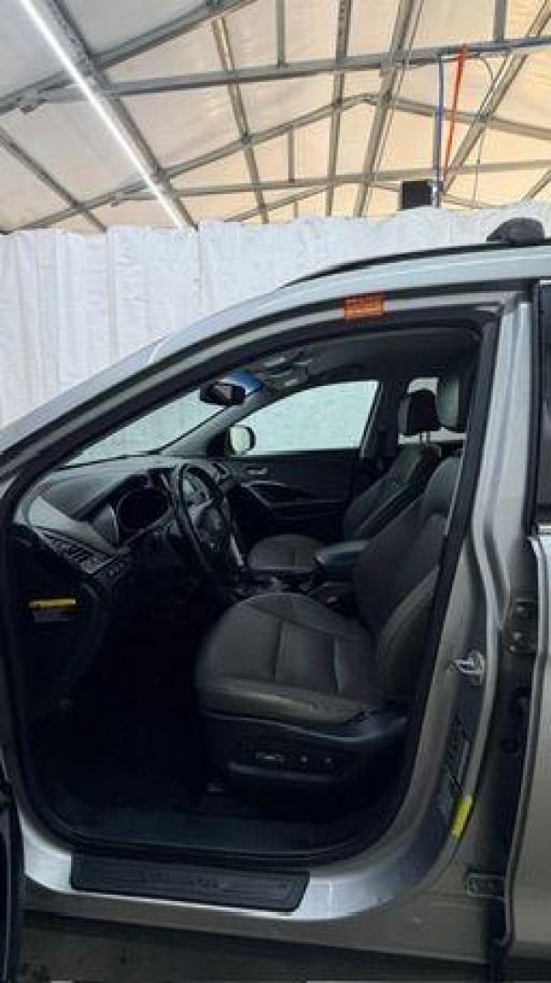 2014 Silver Hyundai Santa Fe GLS (KM8SN4HF3EU) with an Lambda II 3.3L V-6 gasoline direct injection engine, located at 1806 Veterans Memorial Hwy SW, Austell, GA, 30168, (770) 944-9558, 33.817959, -84.606987 - Photo#11