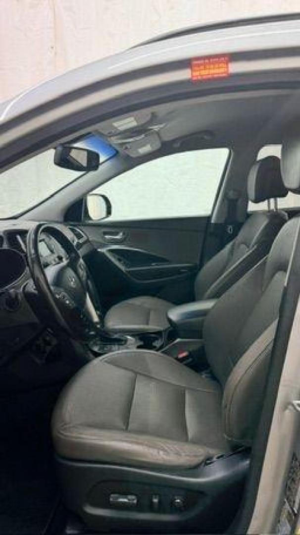 2014 Silver Hyundai Santa Fe GLS (KM8SN4HF3EU) with an Lambda II 3.3L V-6 gasoline direct injection engine, located at 1806 Veterans Memorial Hwy SW, Austell, GA, 30168, (770) 944-9558, 33.817959, -84.606987 - Photo#12