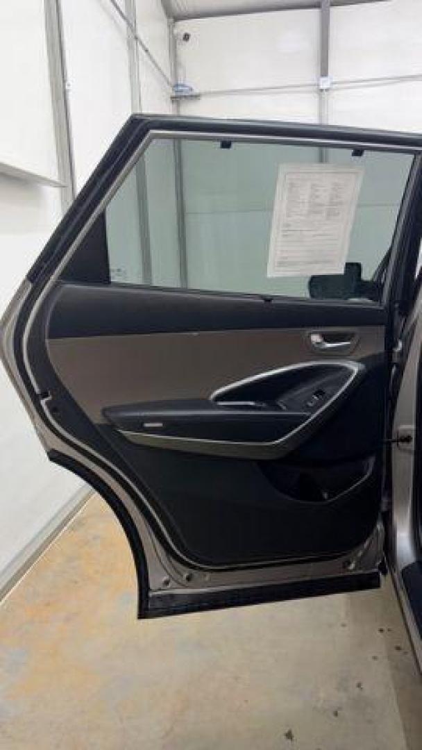 2014 Silver Hyundai Santa Fe GLS (KM8SN4HF3EU) with an Lambda II 3.3L V-6 gasoline direct injection engine, located at 1806 Veterans Memorial Hwy SW, Austell, GA, 30168, (770) 944-9558, 33.817959, -84.606987 - Photo#13