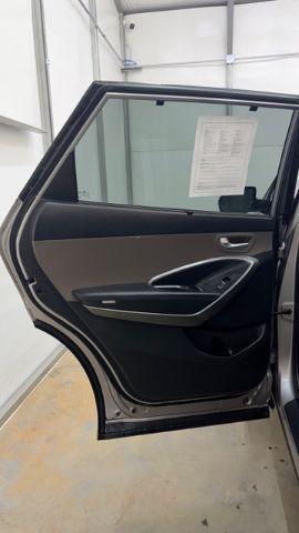 2014 Silver Hyundai Santa Fe GLS (KM8SN4HF3EU) with an Lambda II 3.3L V-6 gasoline direct injection engine, located at 1806 Veterans Memorial Hwy SW, Austell, GA, 30168, (770) 944-9558, 33.817959, -84.606987 - Photo#13