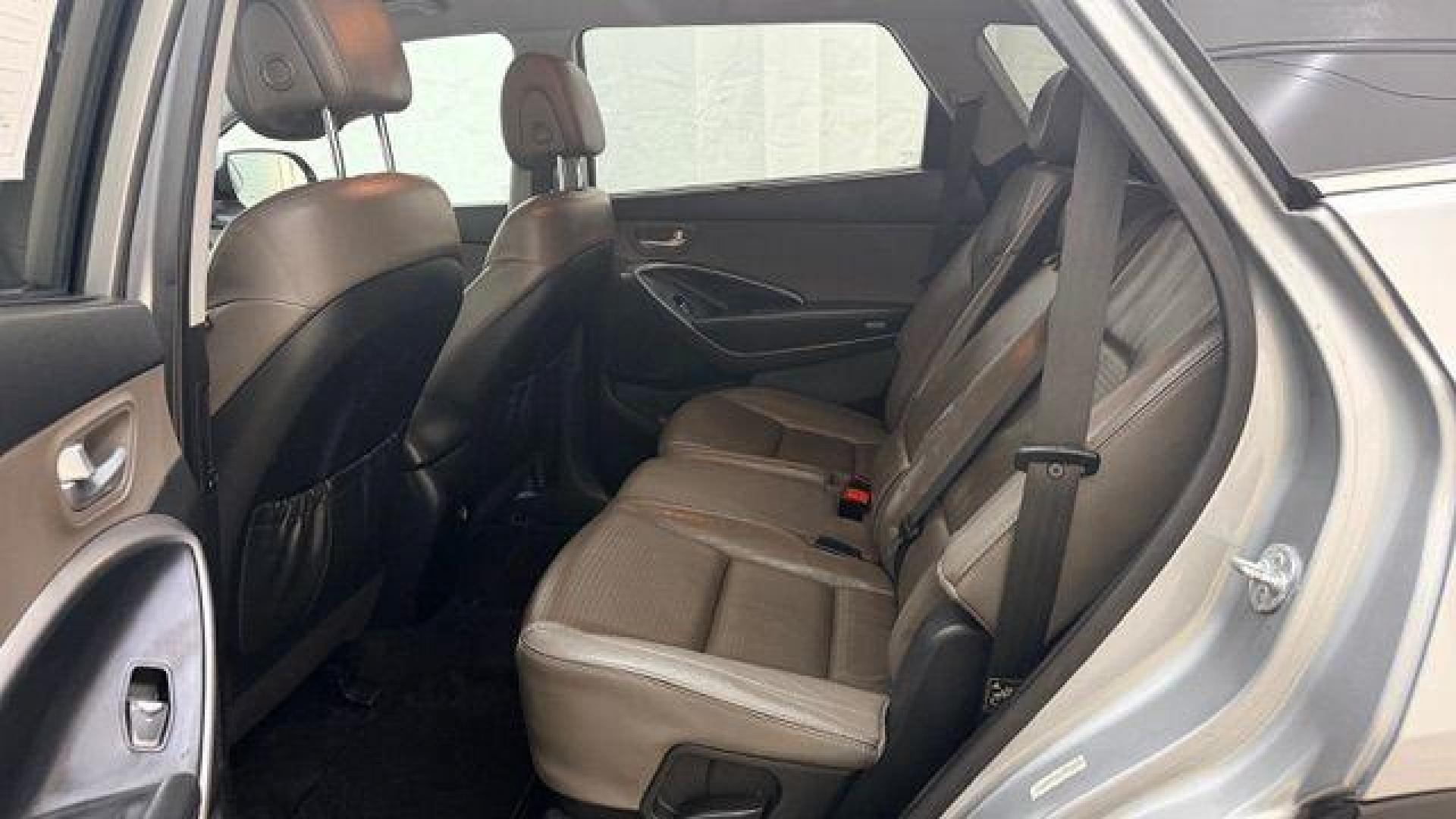 2014 Silver Hyundai Santa Fe GLS (KM8SN4HF3EU) with an Lambda II 3.3L V-6 gasoline direct injection engine, located at 1806 Veterans Memorial Hwy SW, Austell, GA, 30168, (770) 944-9558, 33.817959, -84.606987 - Photo#14