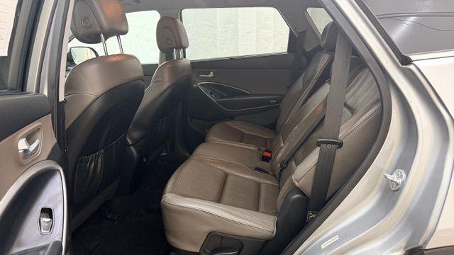 2014 Silver Hyundai Santa Fe GLS (KM8SN4HF3EU) with an Lambda II 3.3L V-6 gasoline direct injection engine, located at 1806 Veterans Memorial Hwy SW, Austell, GA, 30168, (770) 944-9558, 33.817959, -84.606987 - Photo#14