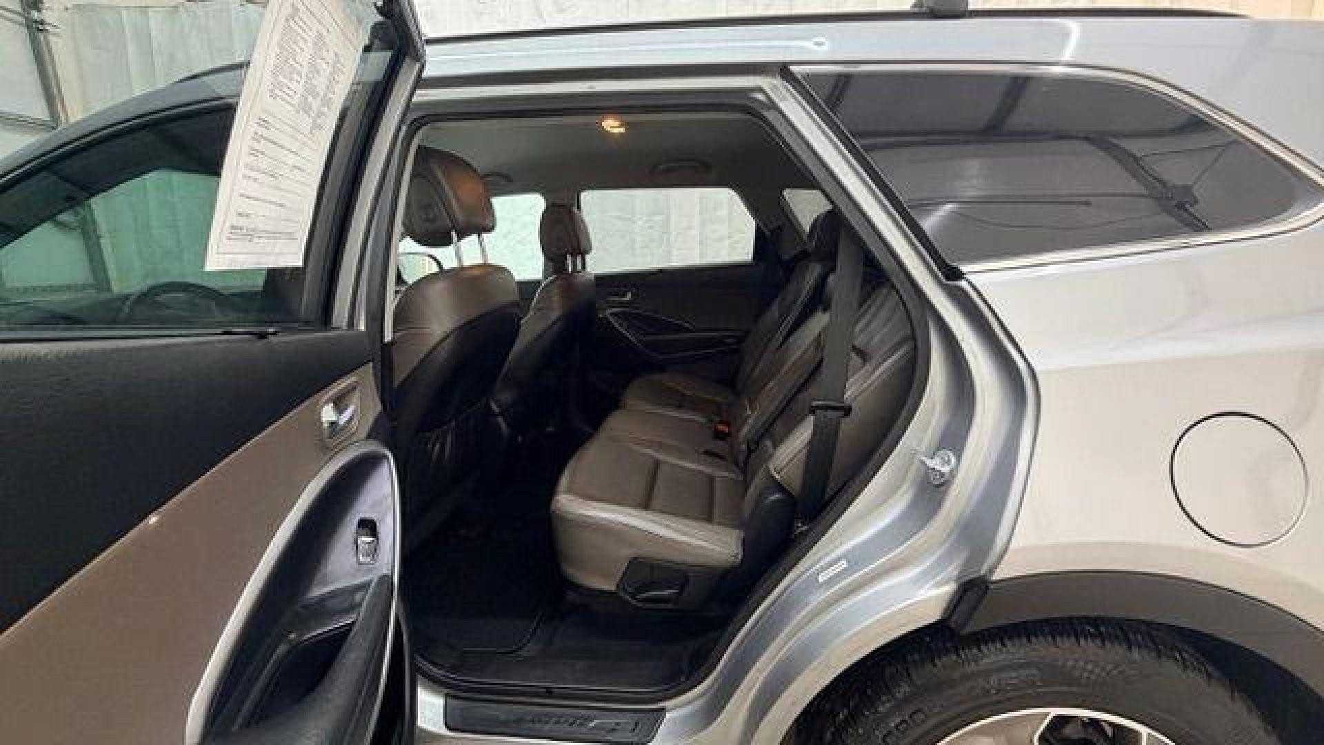 2014 Silver Hyundai Santa Fe GLS (KM8SN4HF3EU) with an Lambda II 3.3L V-6 gasoline direct injection engine, located at 1806 Veterans Memorial Hwy SW, Austell, GA, 30168, (770) 944-9558, 33.817959, -84.606987 - Photo#15