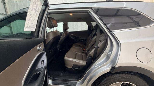 2014 Silver Hyundai Santa Fe GLS (KM8SN4HF3EU) with an Lambda II 3.3L V-6 gasoline direct injection engine, located at 1806 Veterans Memorial Hwy SW, Austell, GA, 30168, (770) 944-9558, 33.817959, -84.606987 - Photo#15