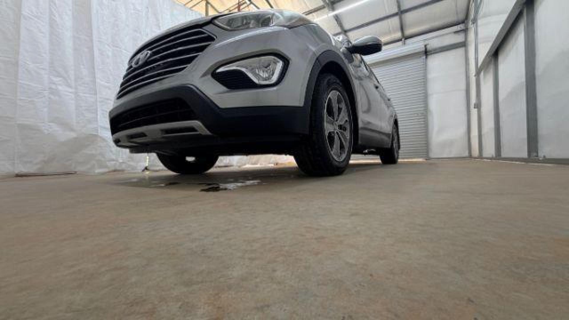 2014 Silver Hyundai Santa Fe GLS (KM8SN4HF3EU) with an Lambda II 3.3L V-6 gasoline direct injection engine, located at 1806 Veterans Memorial Hwy SW, Austell, GA, 30168, (770) 944-9558, 33.817959, -84.606987 - Photo#20