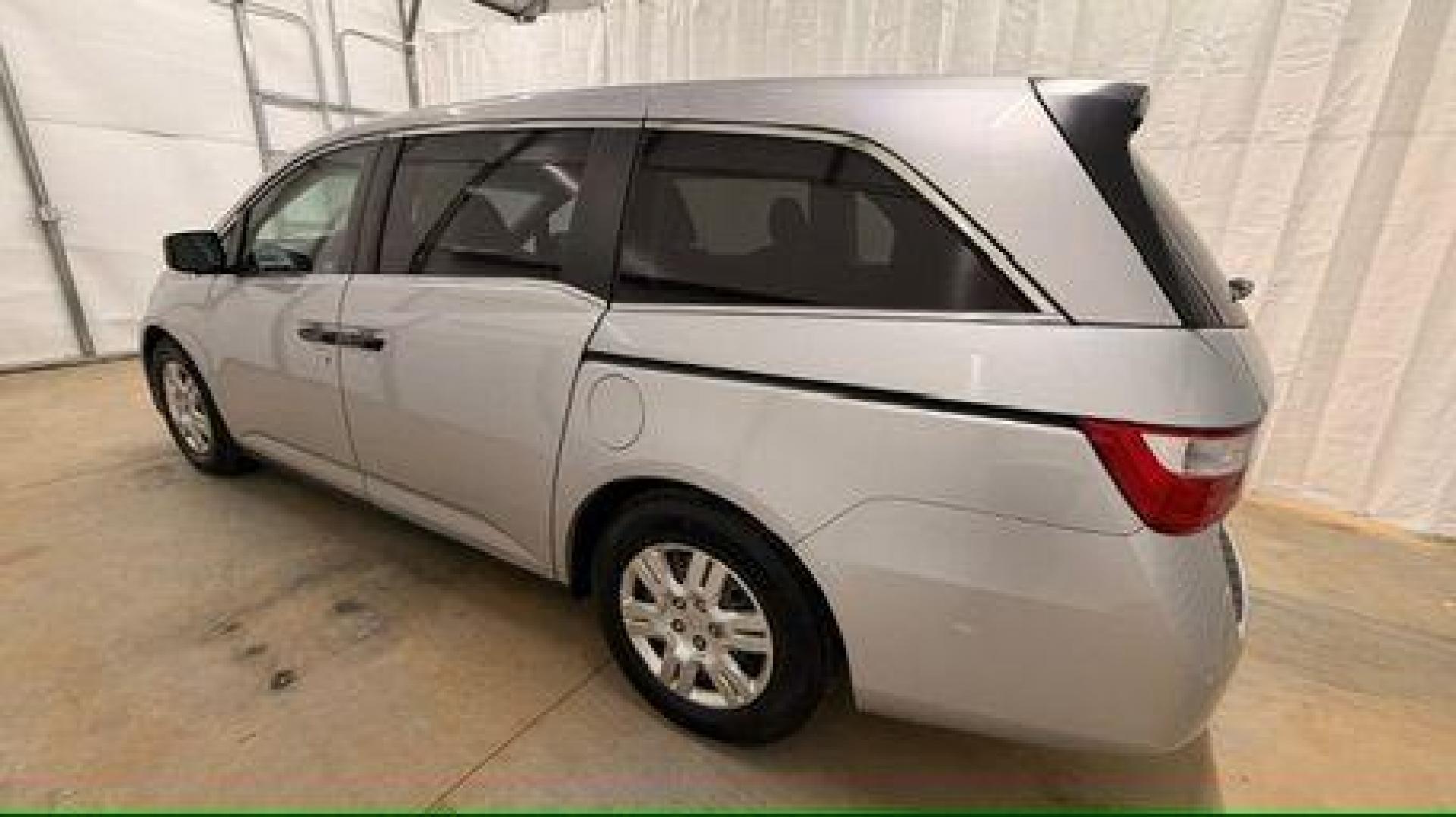 2013 Silver Honda Odyssey LX (5FNRL5H24DB) with an 3.5L V-6 i-VTEC variable valve control engine, located at 1806 Veterans Memorial Hwy SW, Austell, GA, 30168, (770) 944-9558, 33.817959, -84.606987 - Photo#2