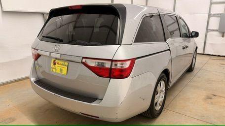 2013 Silver Honda Odyssey LX (5FNRL5H24DB) with an 3.5L V-6 i-VTEC variable valve control engine, located at 1806 Veterans Memorial Hwy SW, Austell, GA, 30168, (770) 944-9558, 33.817959, -84.606987 - Photo#5